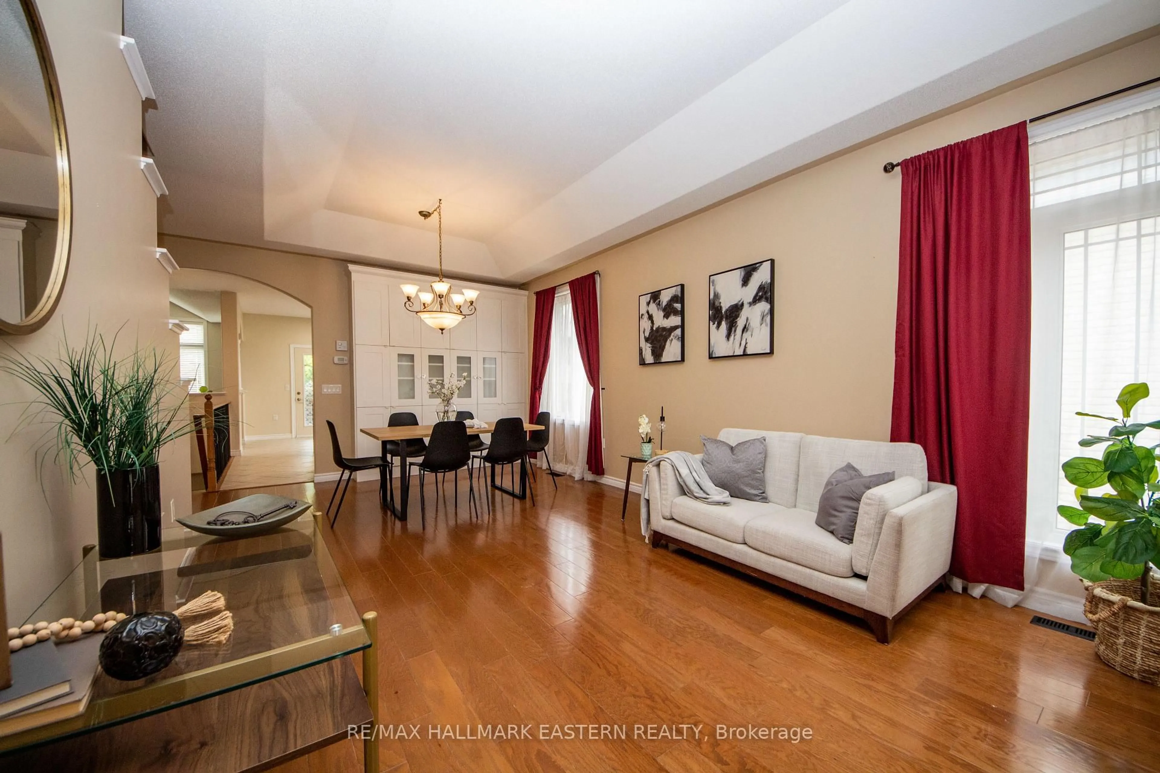 Living room with furniture, wood/laminate floor for 1568 Ireland Dr, Peterborough West Ontario K9K 2T2