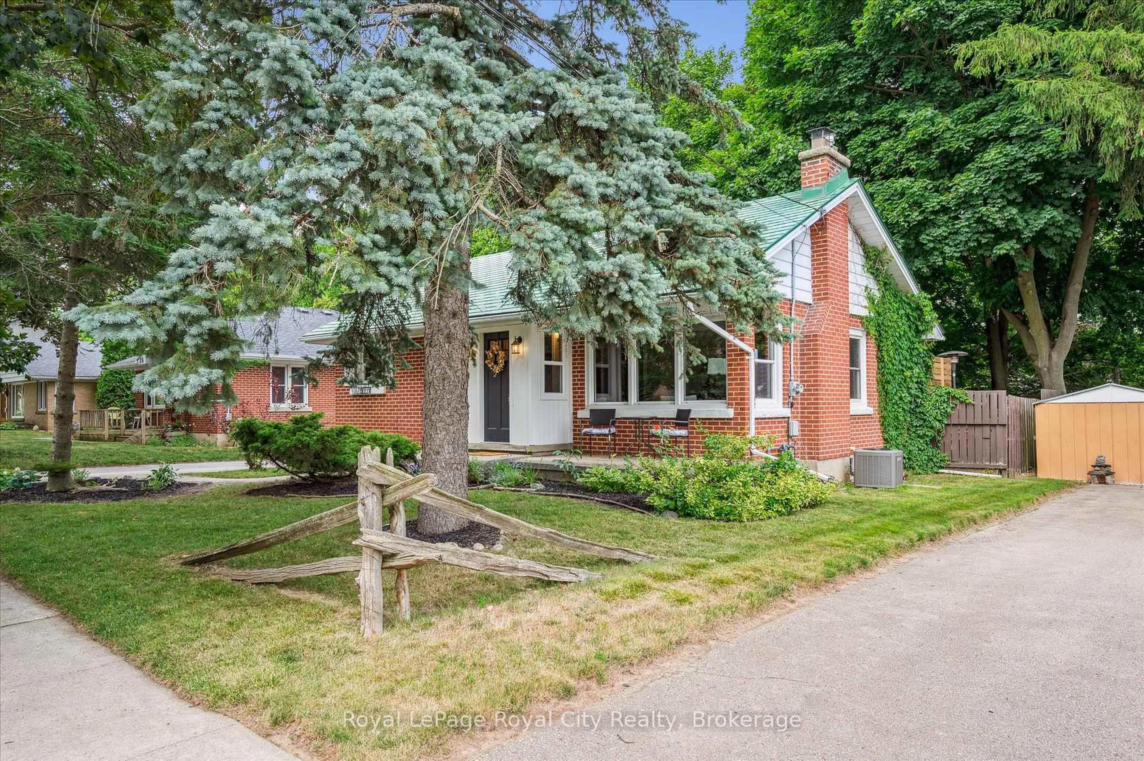 Home with brick exterior material, street for 28 Summit Cres, Guelph Ontario N1H 1S3