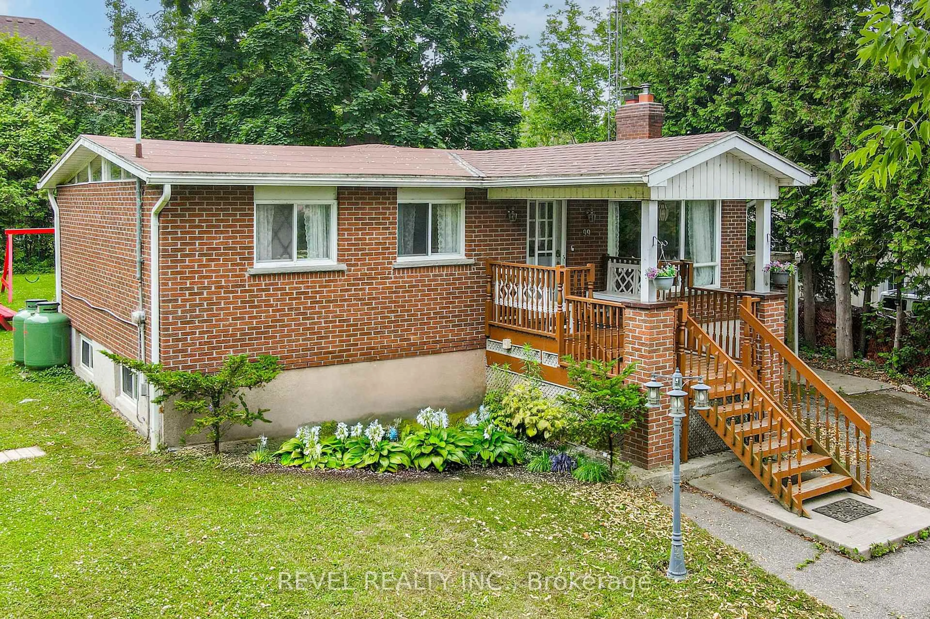 Home with brick exterior material, street for 99 Bowen Rd, Kawartha Lakes Ontario K0M 2C0