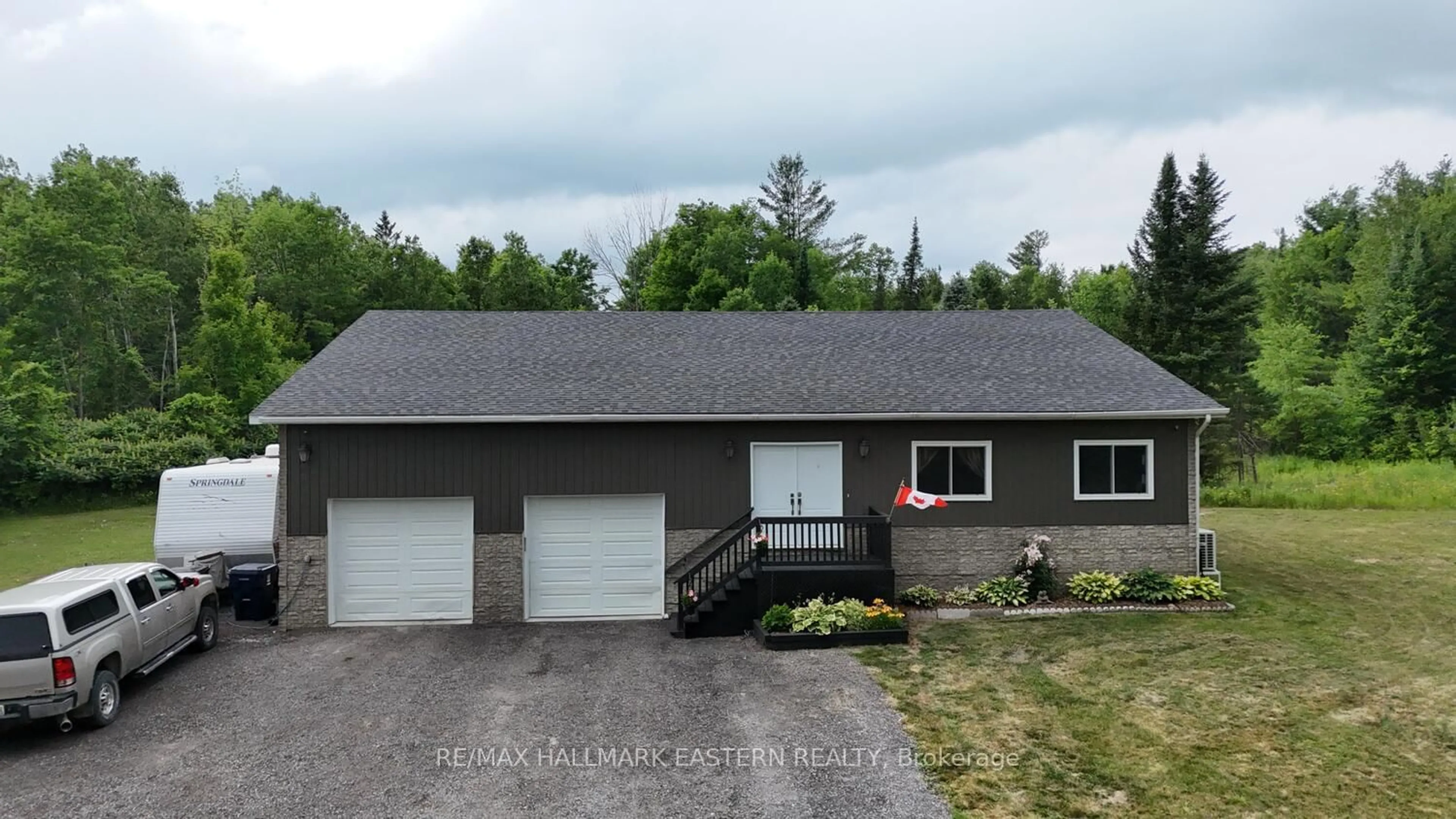 A pic from outside/outdoor area/front of a property/back of a property/a pic from drone, unknown for 178 Roma Lane, Limoges Ontario K0K 2M0