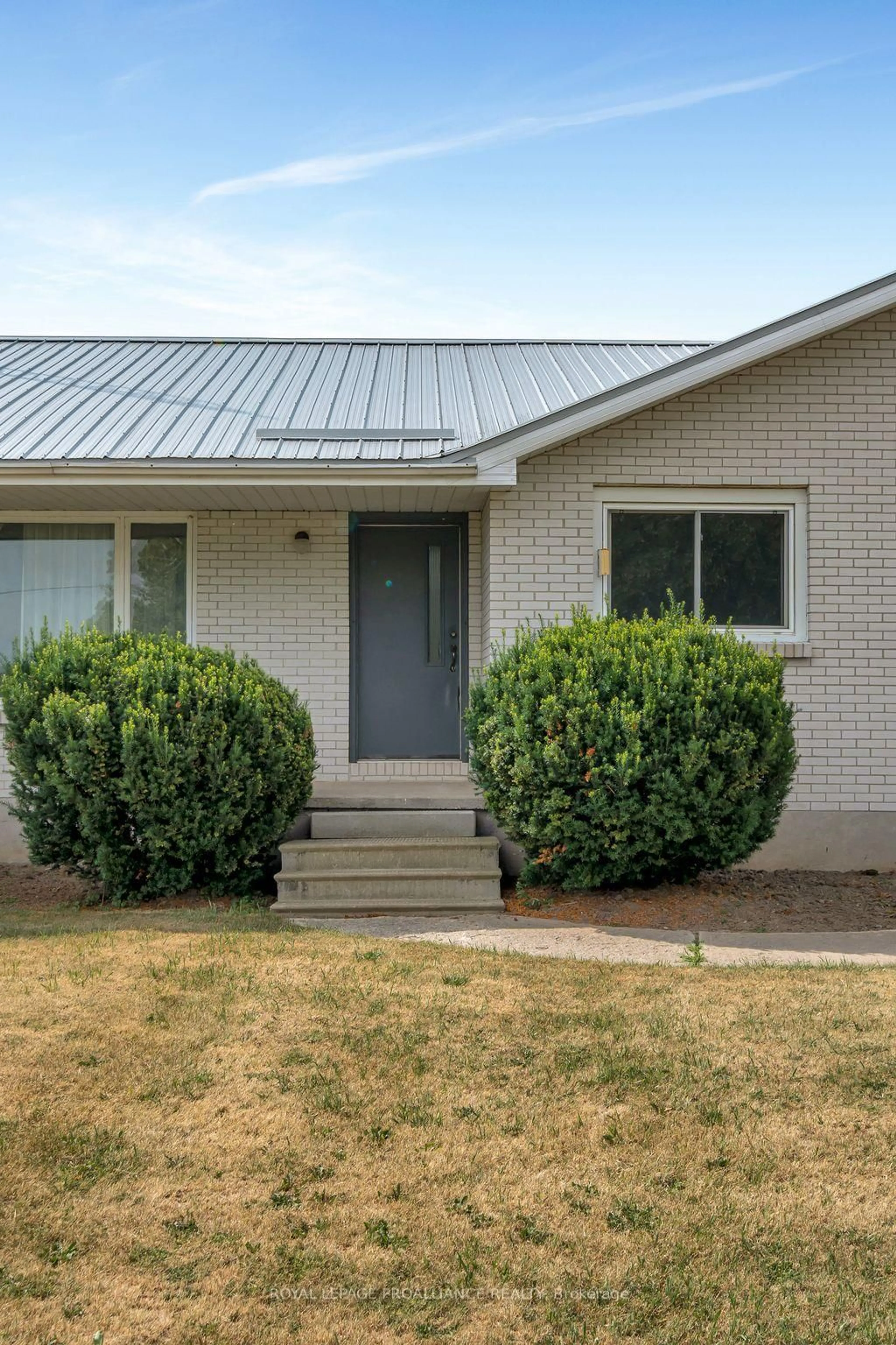 Home with brick exterior material, street for 207 Carmel Rd, Stirling Ontario K0K 3E0