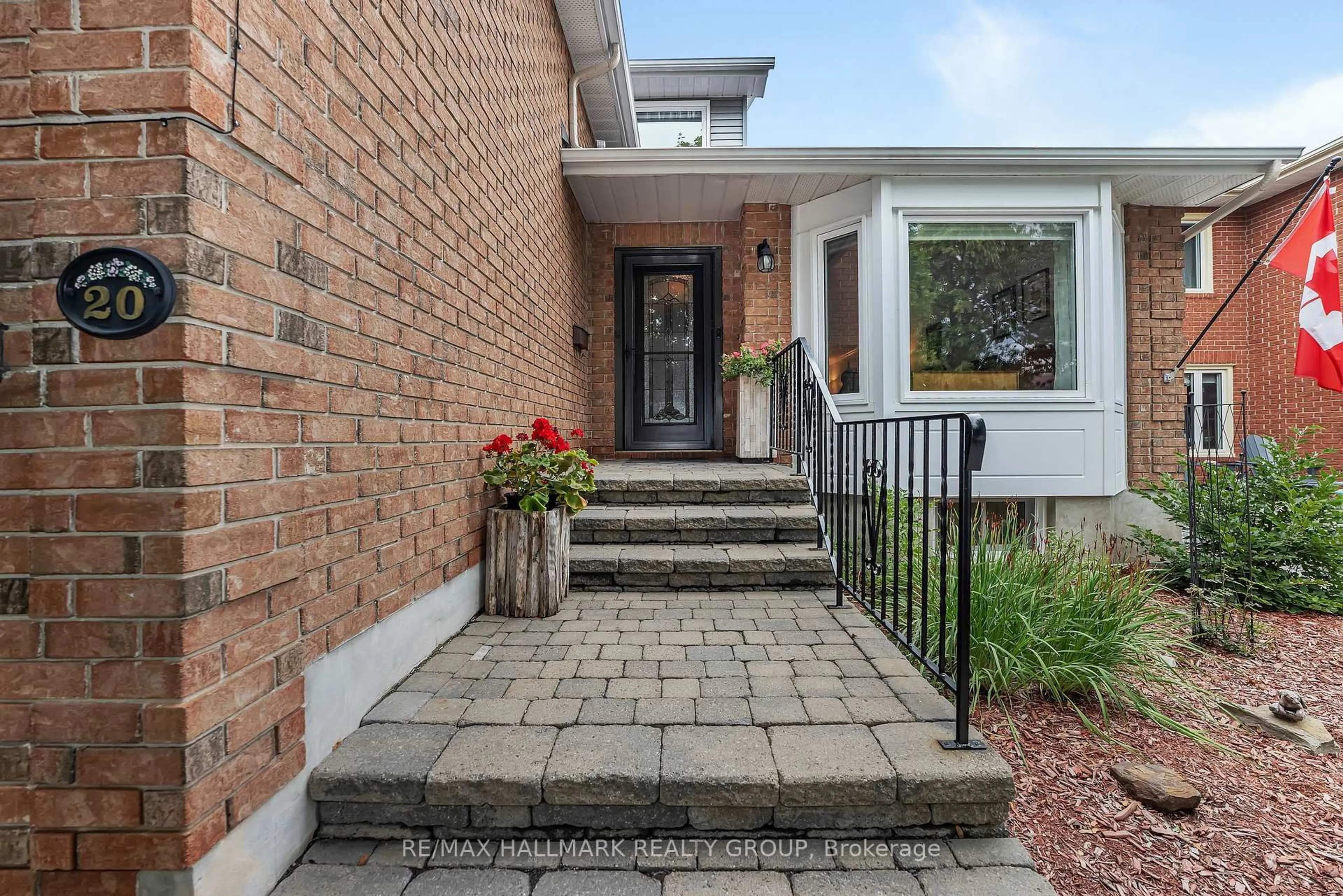 Home with brick exterior material, street for 20 Bluemeadow Way, Ottawa Ontario K2M 1L6