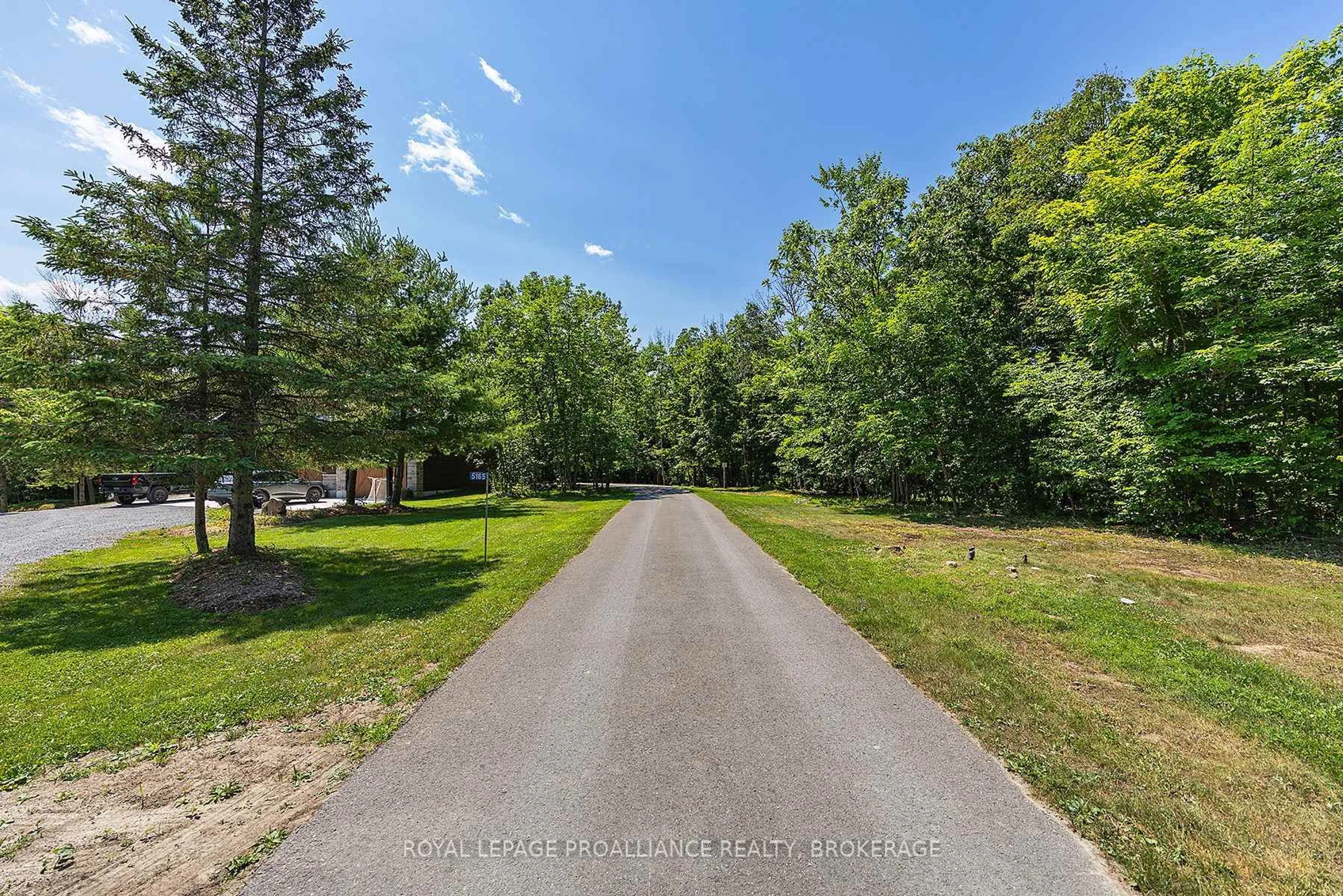 A pic from outside/outdoor area/front of a property/back of a property/a pic from drone, forest/trees view for 5165 Valley Lane, Perth Road Ontario K0H 2L0