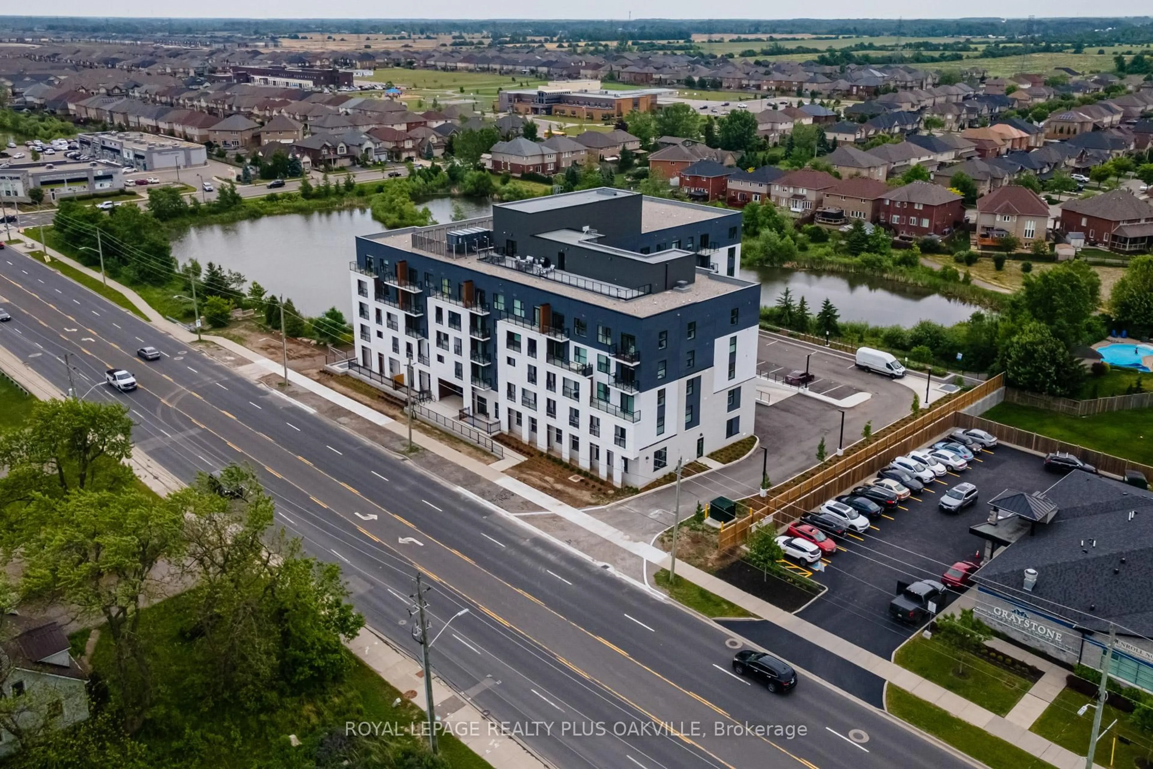 A pic from outside/outdoor area/front of a property/back of a property/a pic from drone, unknown for 1936 Rymal Rd #221, Hamilton Ontario L0R 1P0