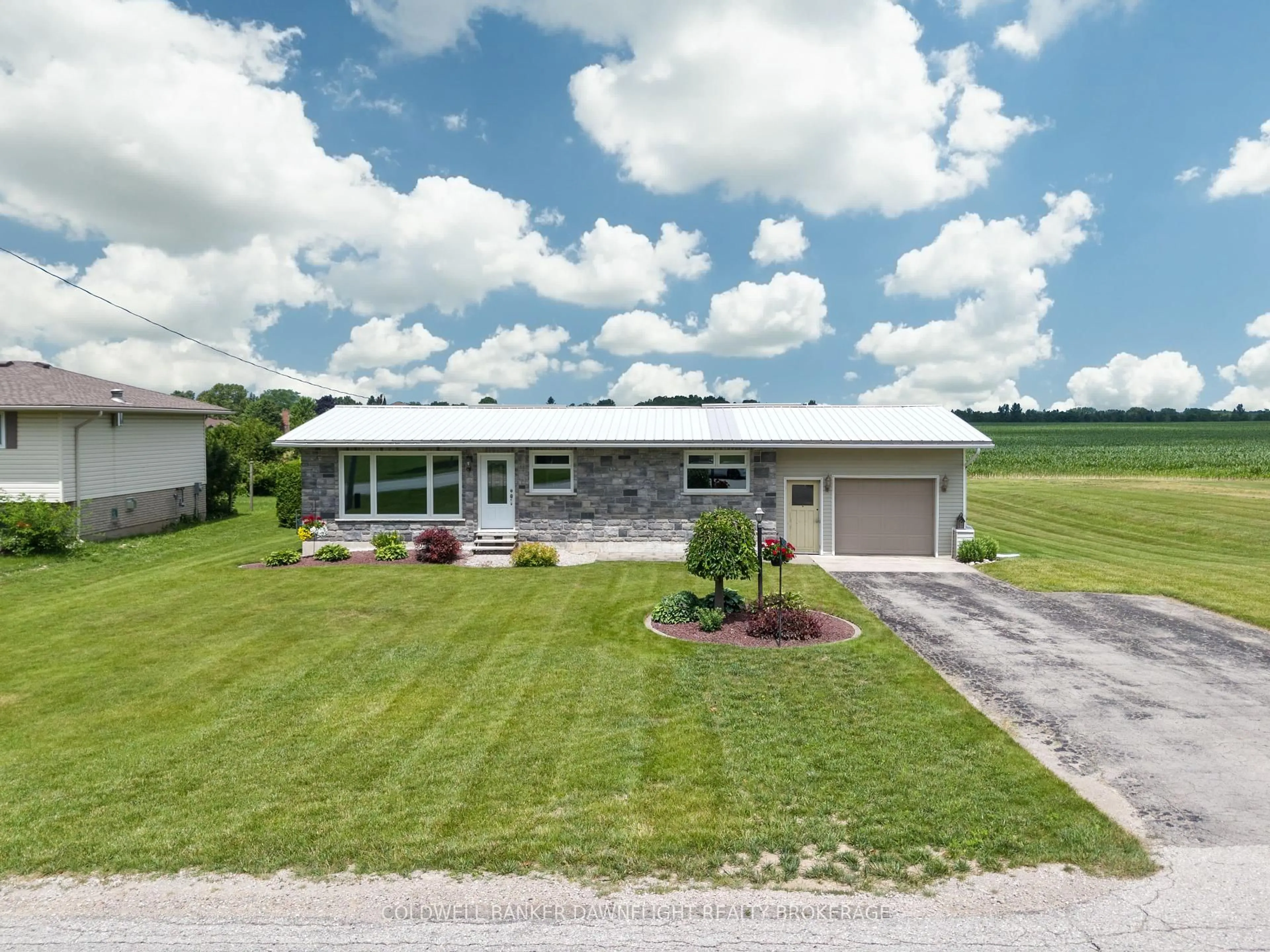 A pic from outside/outdoor area/front of a property/back of a property/a pic from drone, unknown for 40214 Huron St, South Huron Ontario N0M 1S5