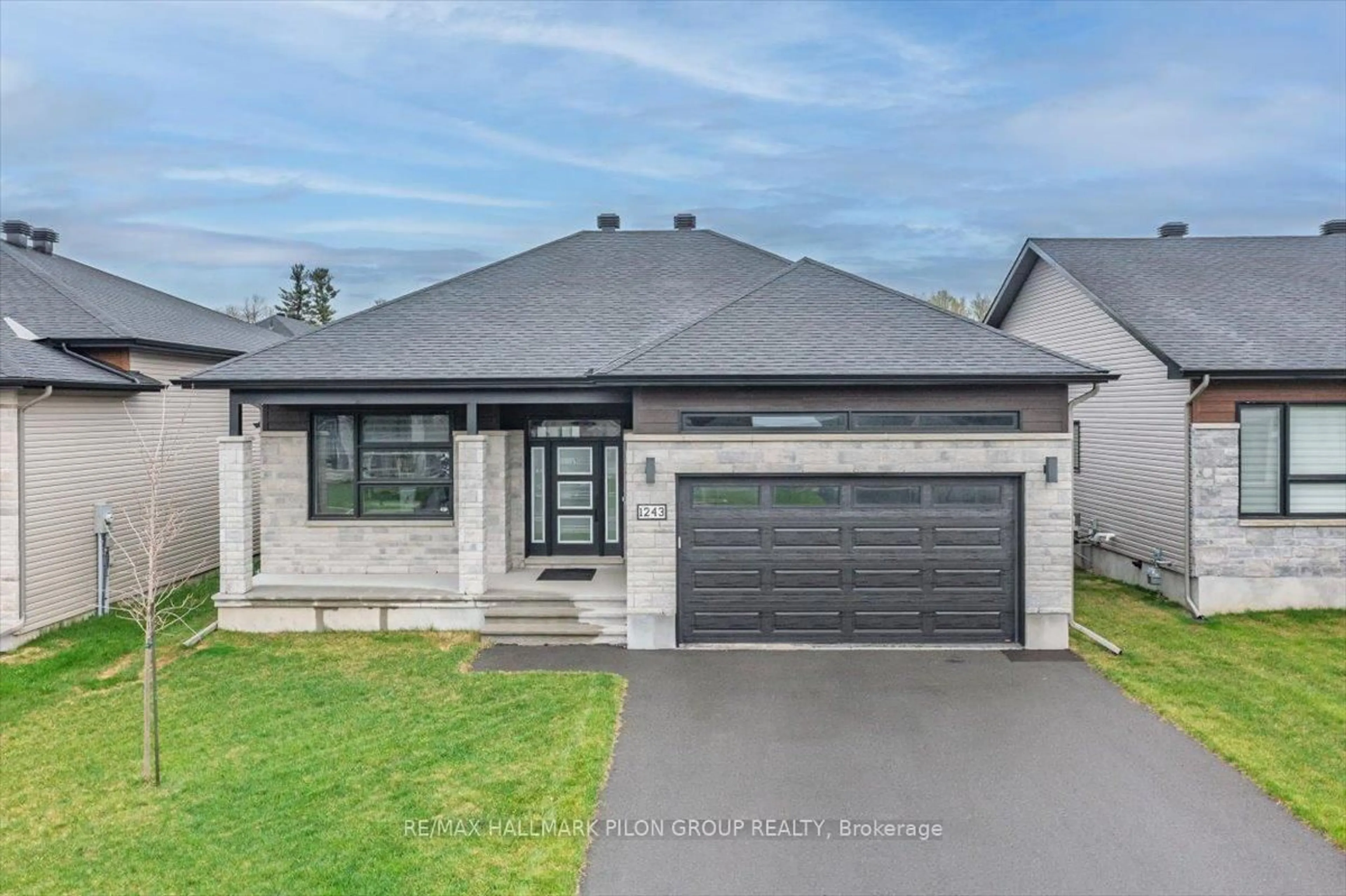 Home with brick exterior material, street for 1243 Avignon St, Russell Ontario K0A 1W0
