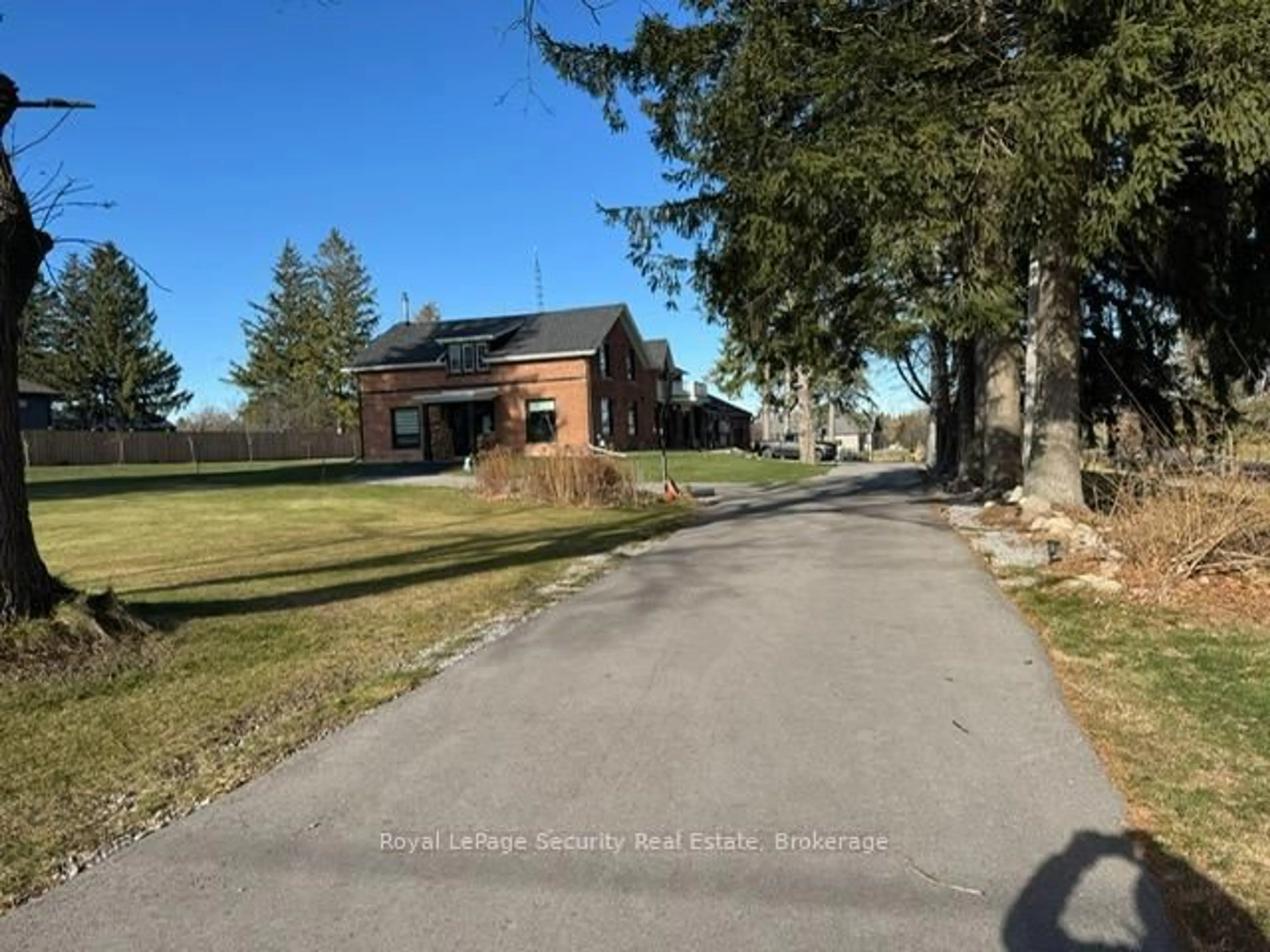 A pic from outside/outdoor area/front of a property/back of a property/a pic from drone, street for 556 Fallis Line, Cavan Monaghan Ontario L0A 1G0