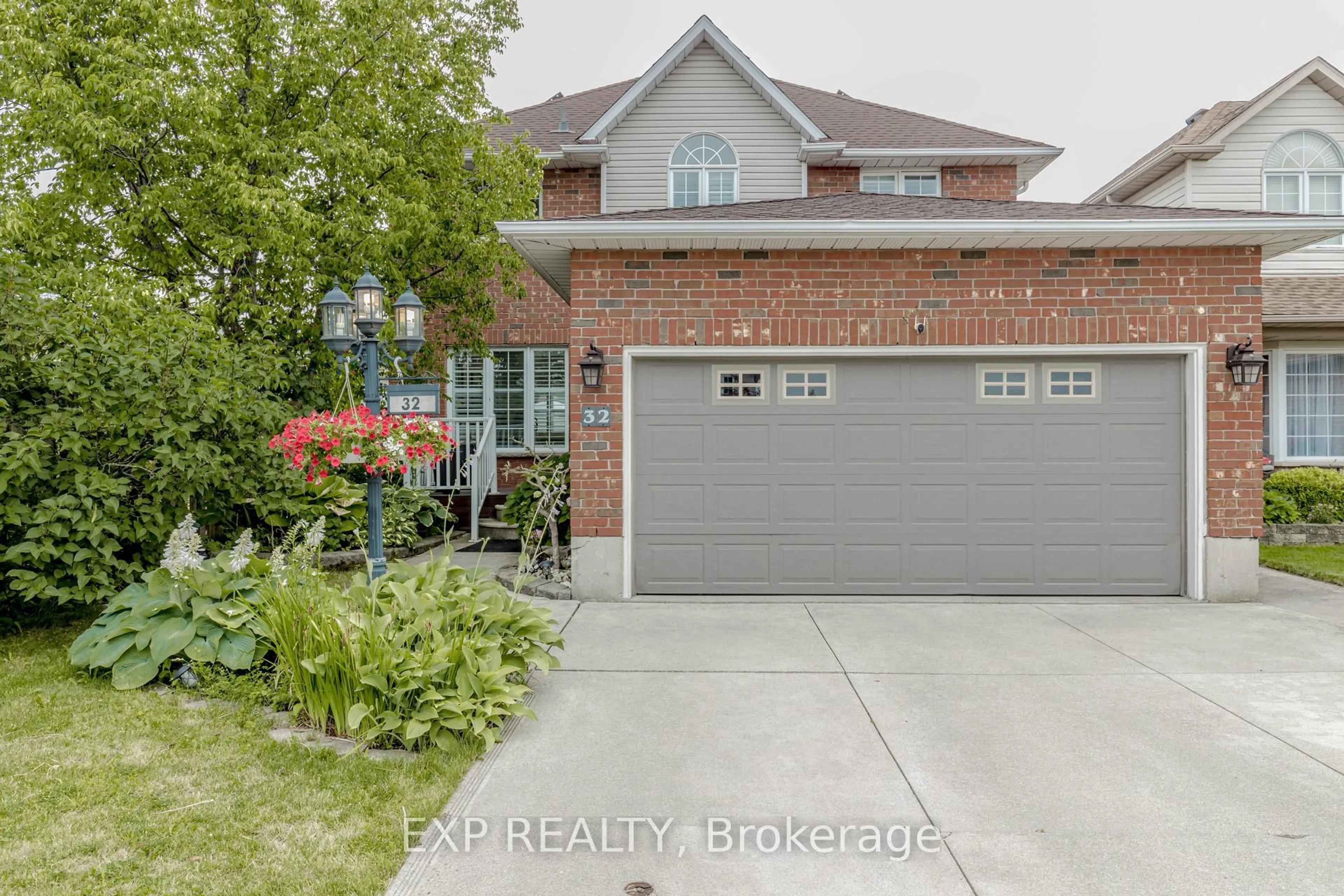 Home with brick exterior material, street for 32 Vineberg Dr, Hamilton Ontario L9B 2P6