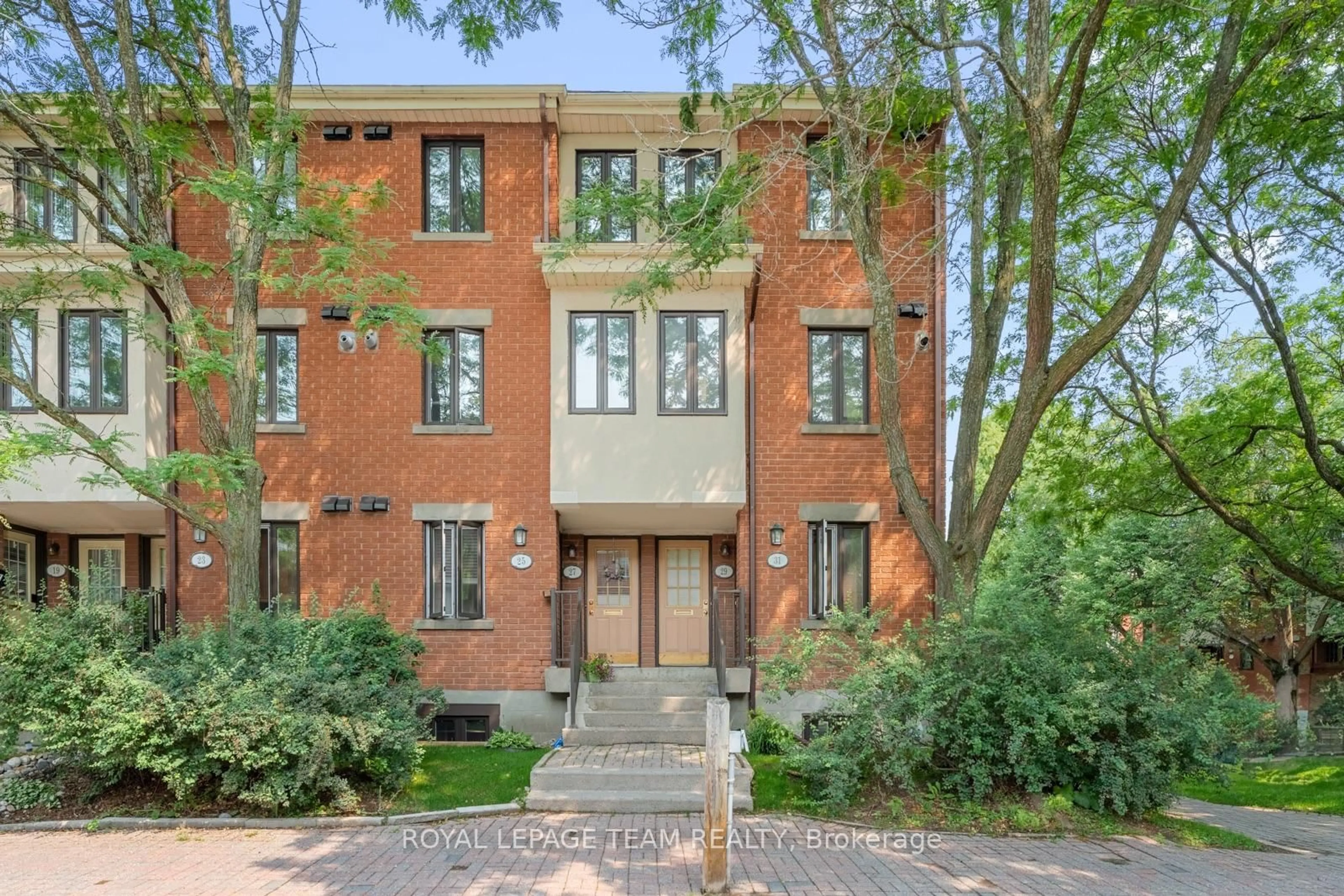 Home with brick exterior material, street for 25 Sheba Private, Ottawa Ontario K1K 4K8