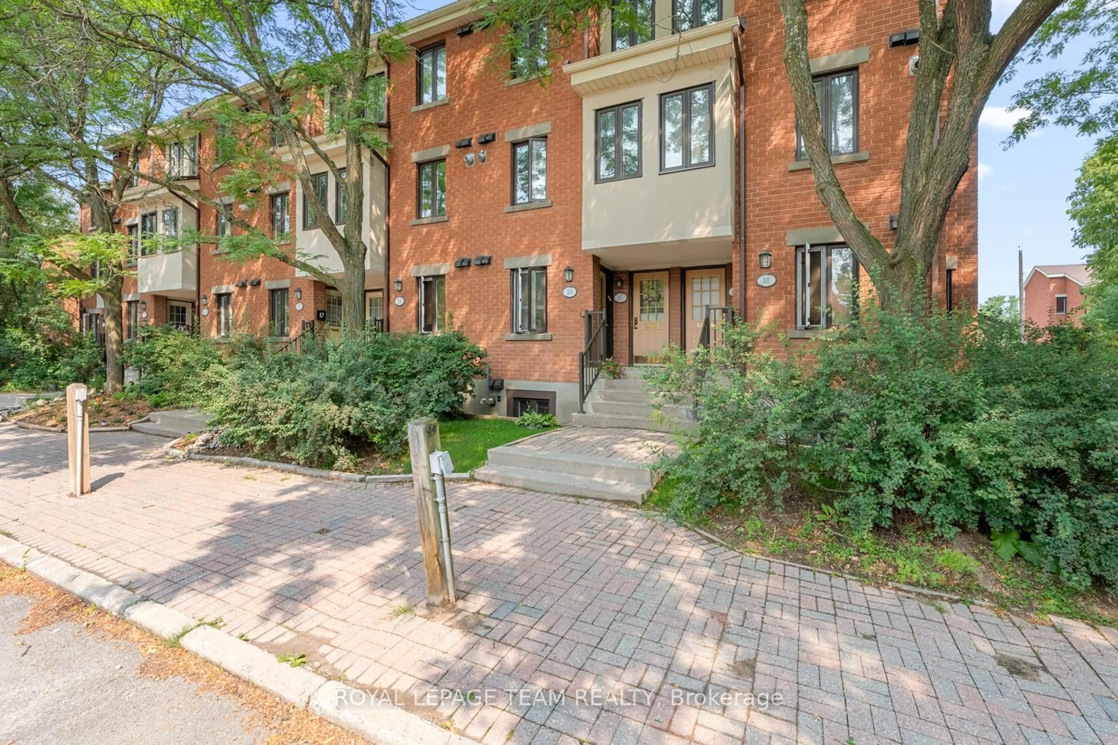Home with brick exterior material, street for 25 Sheba Private, Ottawa Ontario K1K 4K8