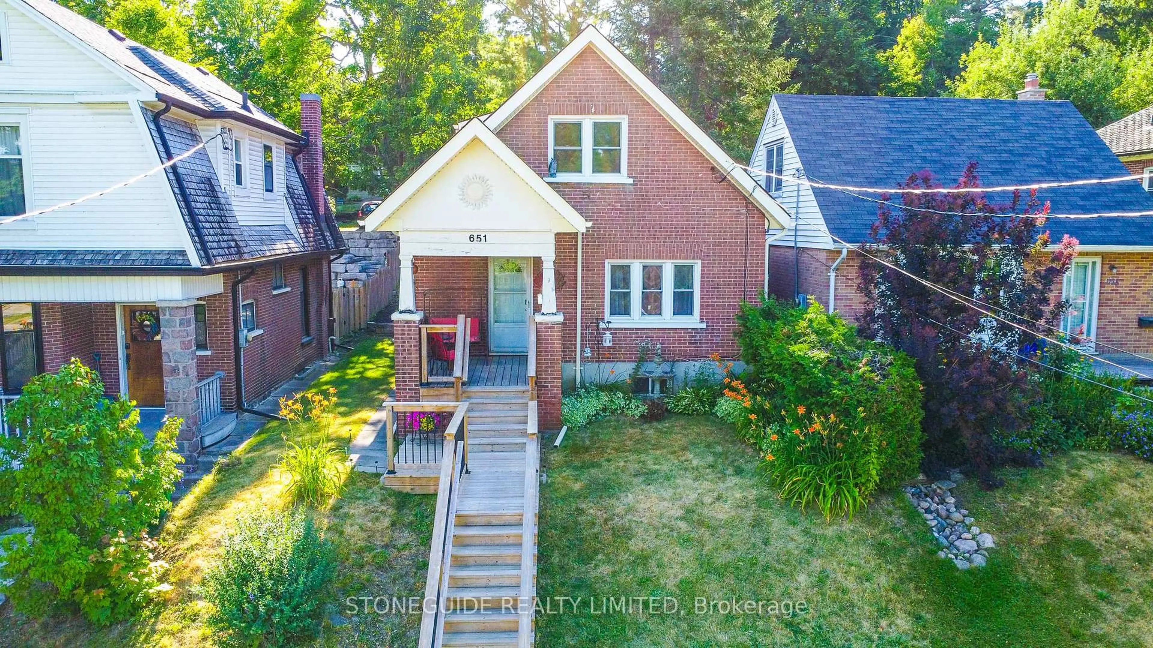 A pic from outside/outdoor area/front of a property/back of a property/a pic from drone, street for 651 Aylmer St, Peterborough Central Ontario K9H 3X3