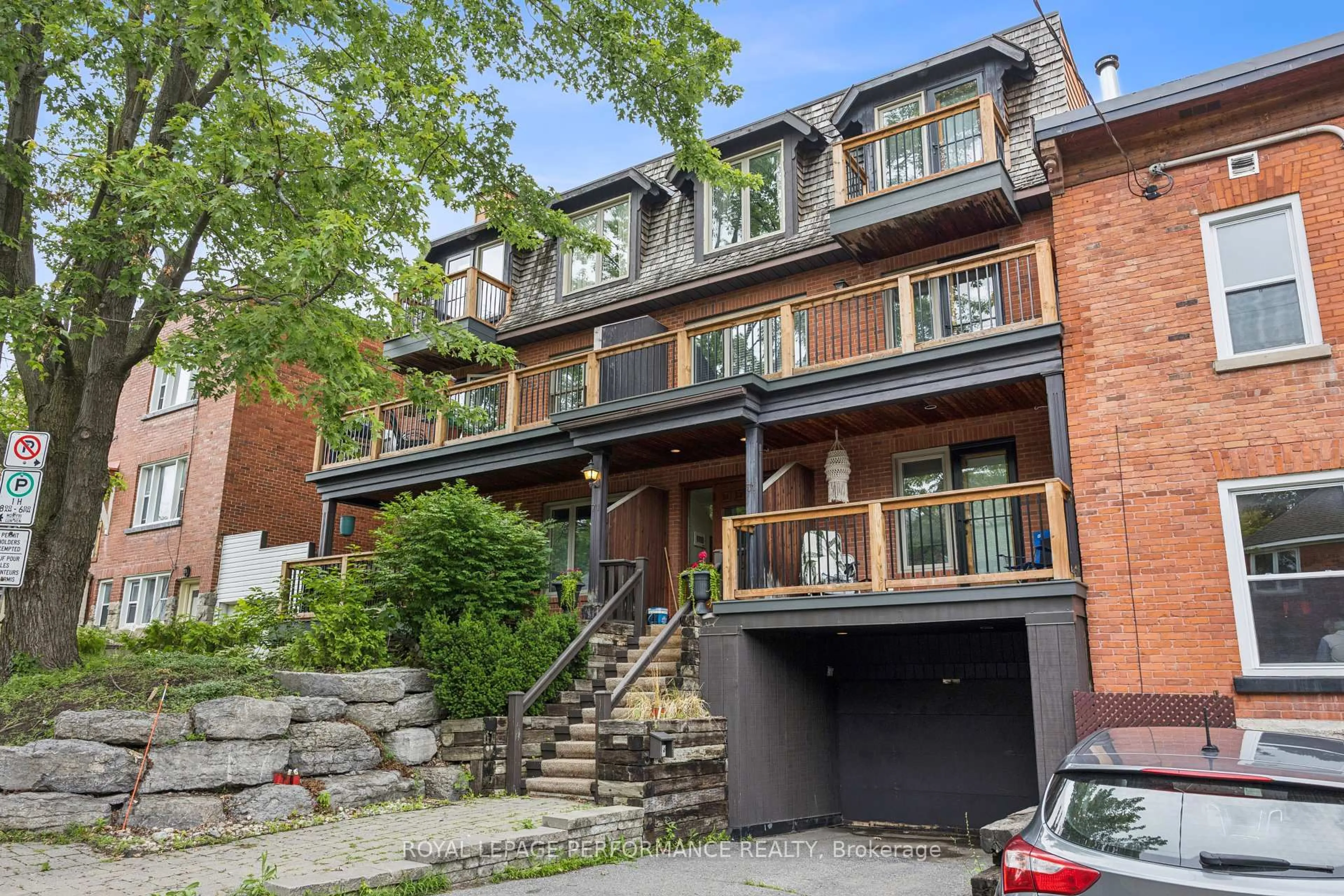 Home with brick exterior material, street for 71 Sweetland Ave #4, Ottawa Ontario K1N 7T9