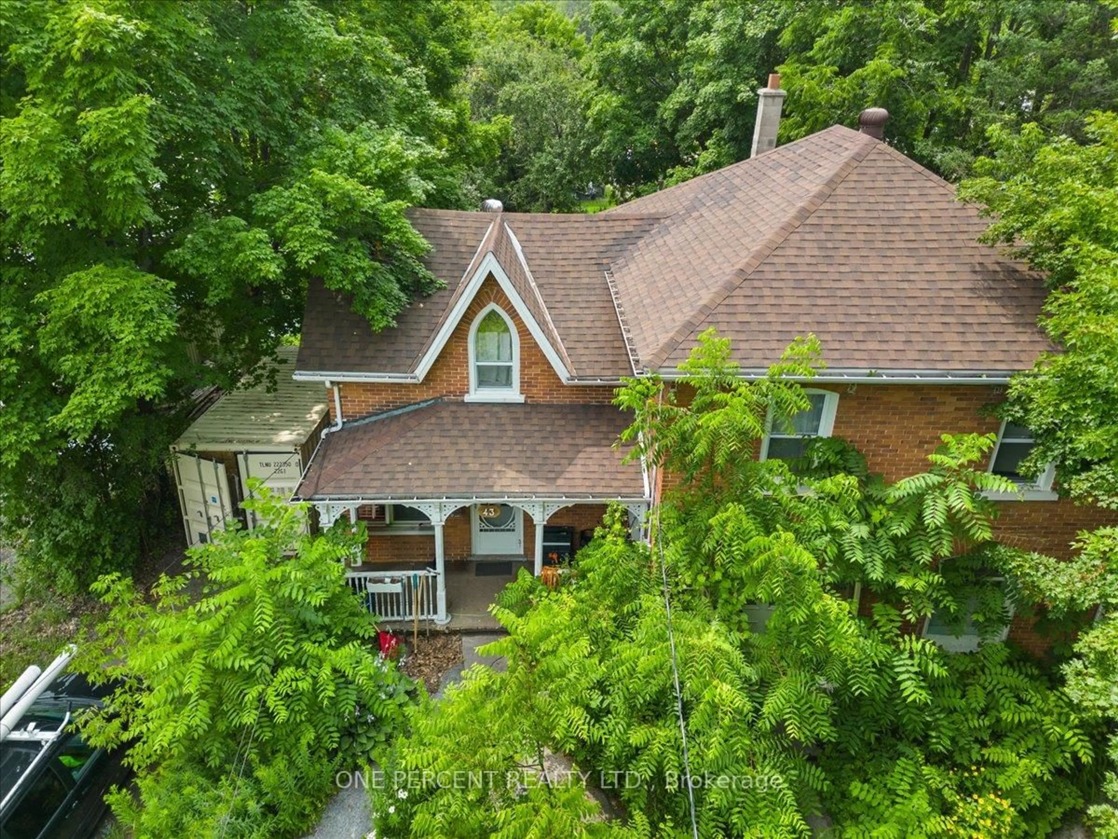 A pic from outside/outdoor area/front of a property/back of a property/a pic from drone, forest/trees view for 43 Forsyth St, Limoges Ontario K0K 2M0