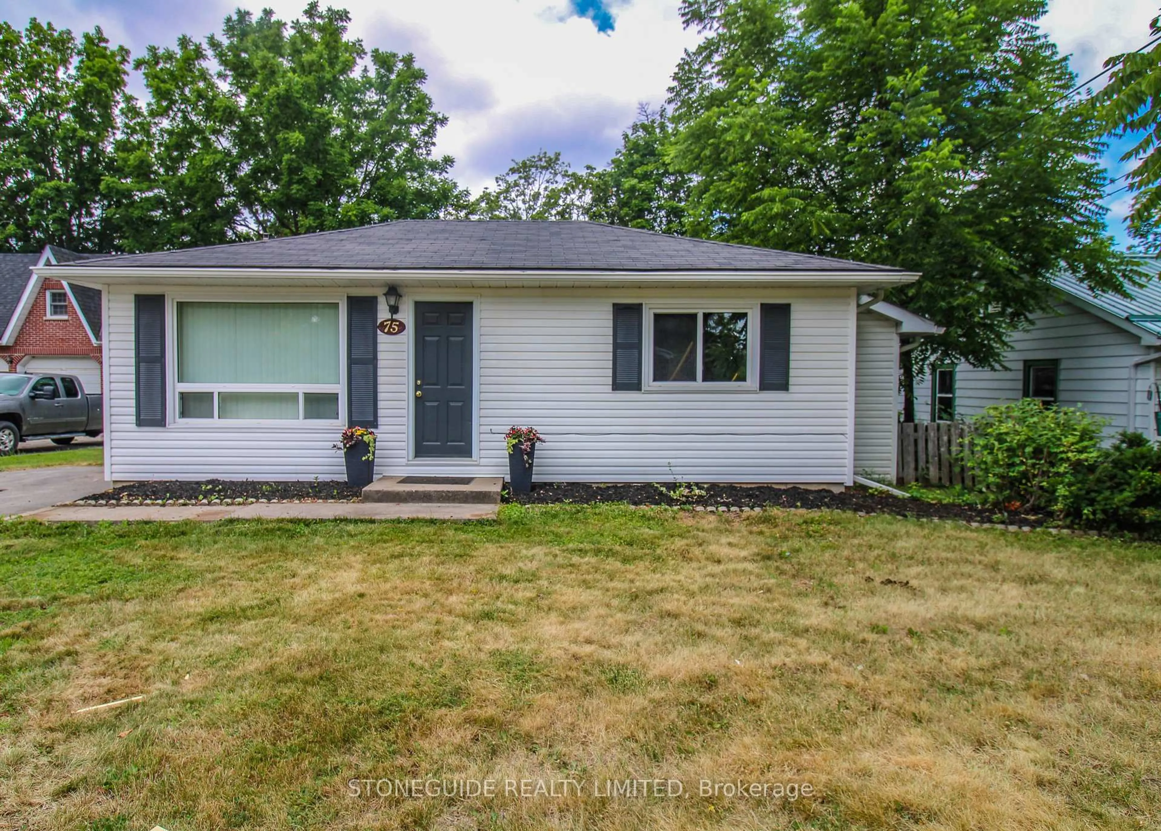 Home with vinyl exterior material, street for 75 Fraser St, Selwyn Ontario K9J 0C5