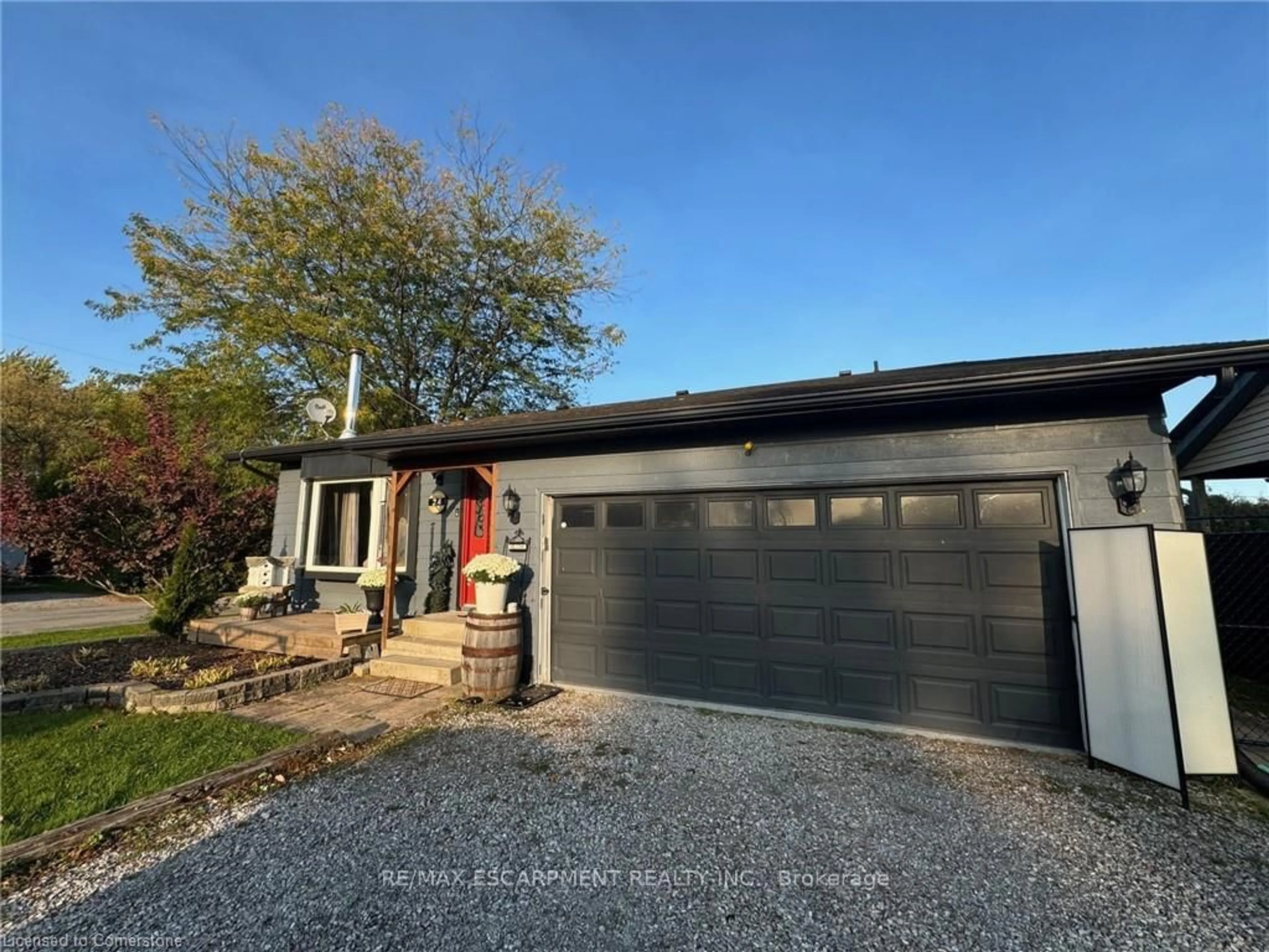 A pic from outside/outdoor area/front of a property/back of a property/a pic from drone, street for 24 Woodhouse Ave, Haldimand Ontario N0A 1N8