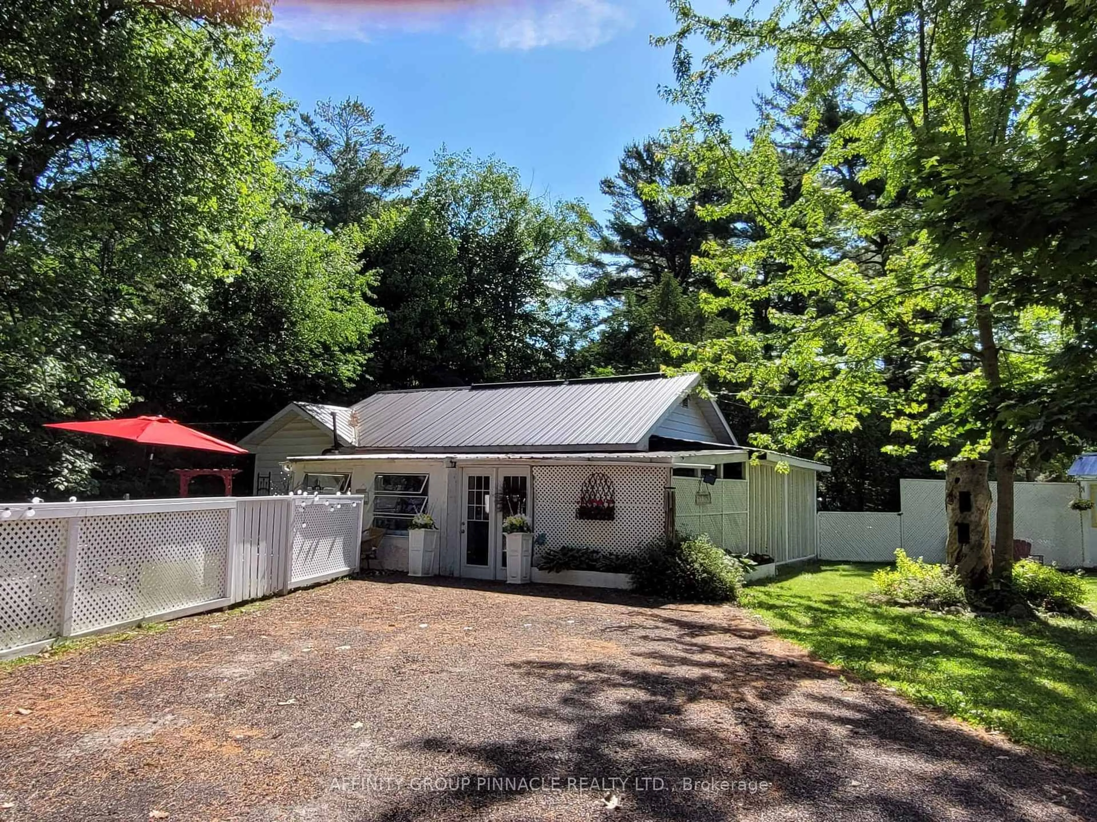 A pic from outside/outdoor area/front of a property/back of a property/a pic from drone, street for 8 Parkhill Dr, Kawartha Lakes Ontario K0M 1A0