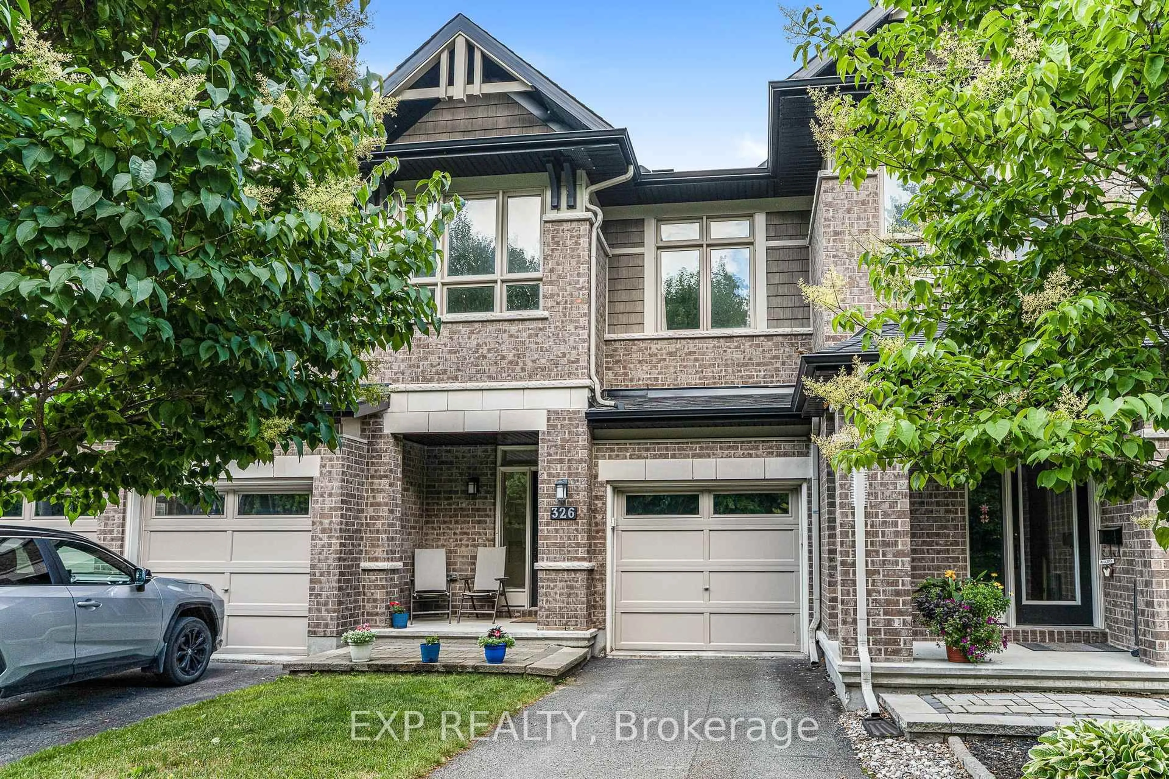 Home with brick exterior material, street for 326 Trailsedge Way, Ottawa Ontario K1W 0G6