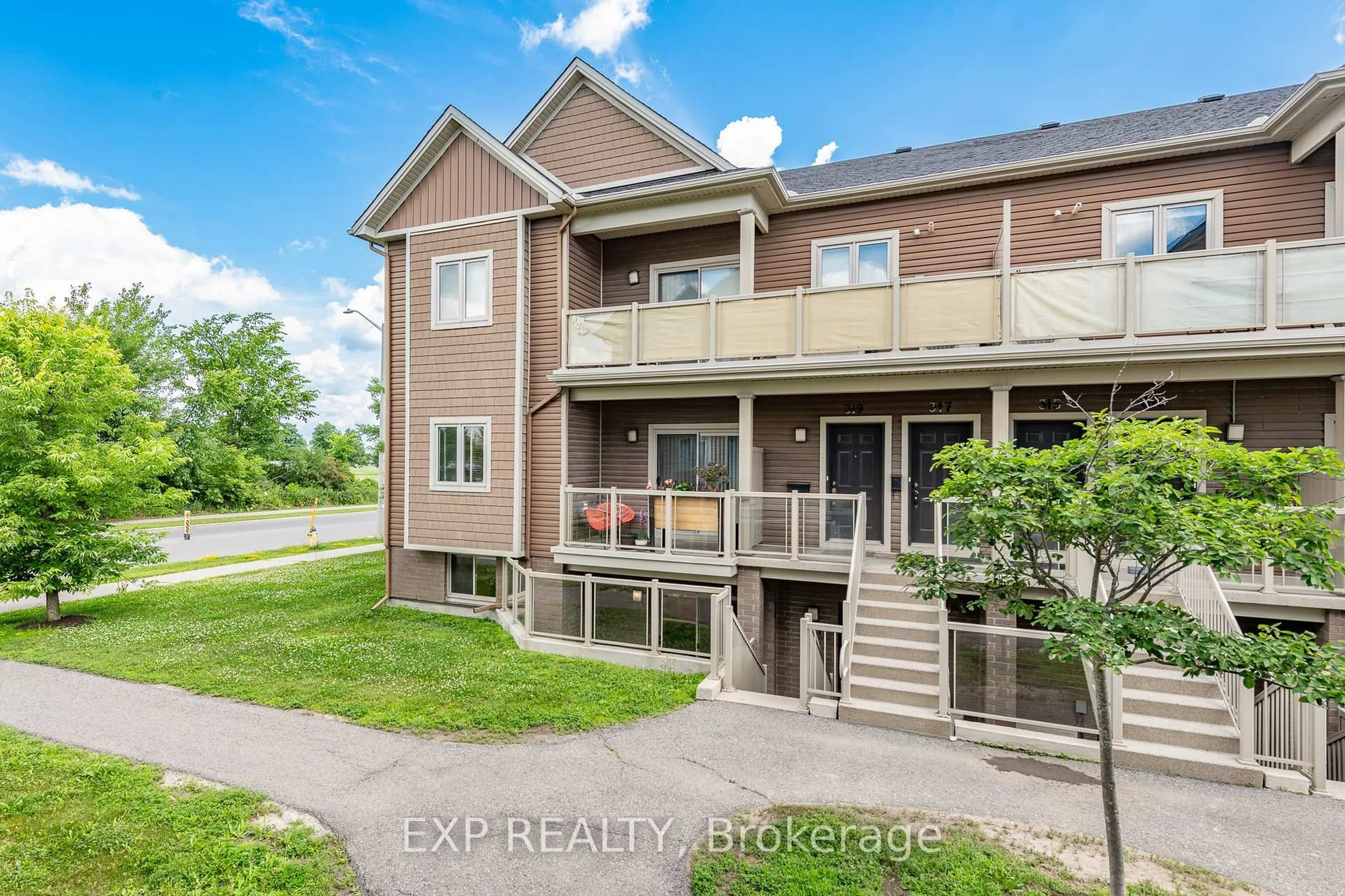 A pic from outside/outdoor area/front of a property/back of a property/a pic from drone, unknown for 321 Big Sky Private, Ottawa Ontario K1T 0M8
