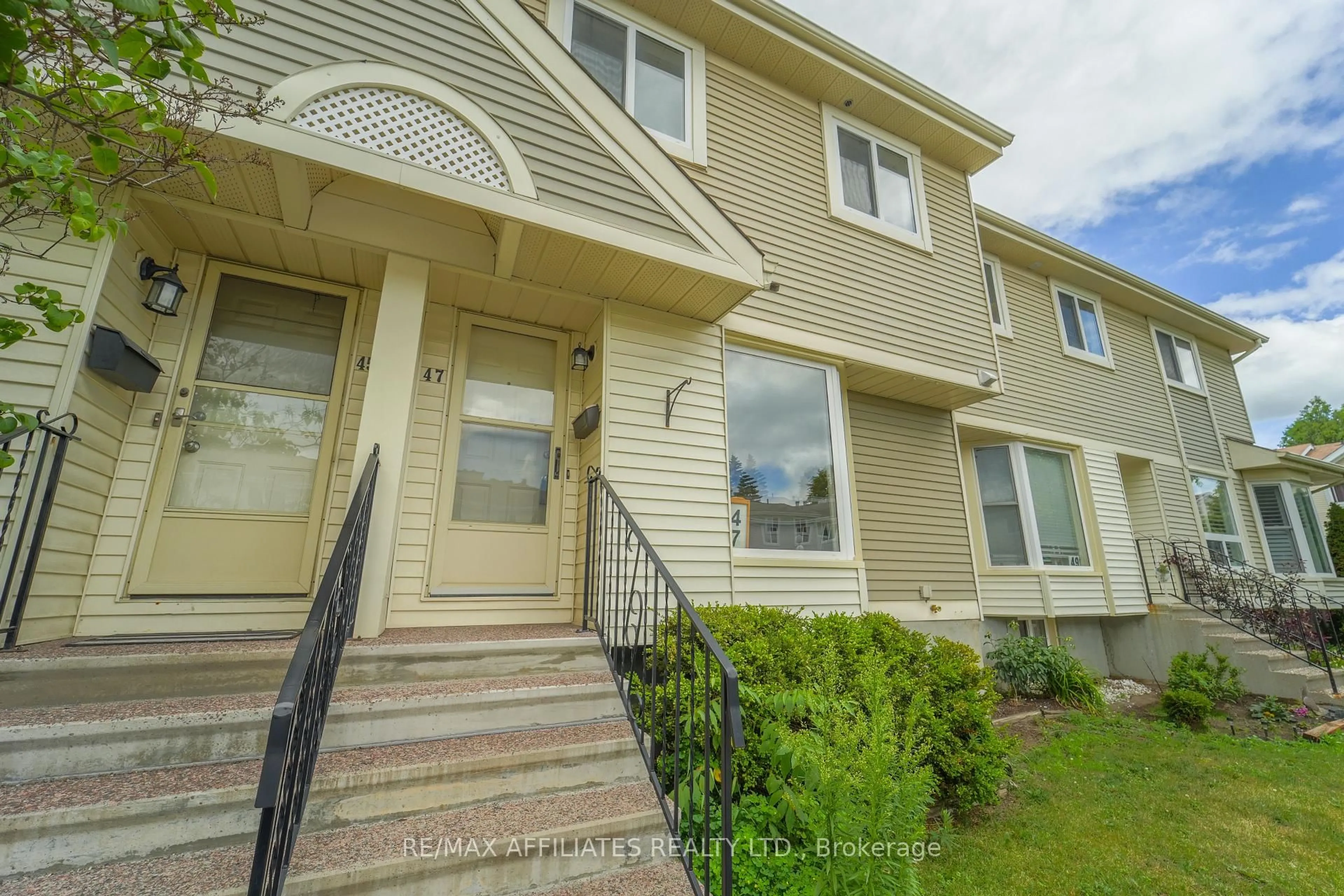 Home with vinyl exterior material, street for 47 Mcdermot Crt #65, Ottawa Ontario K2L 3V5
