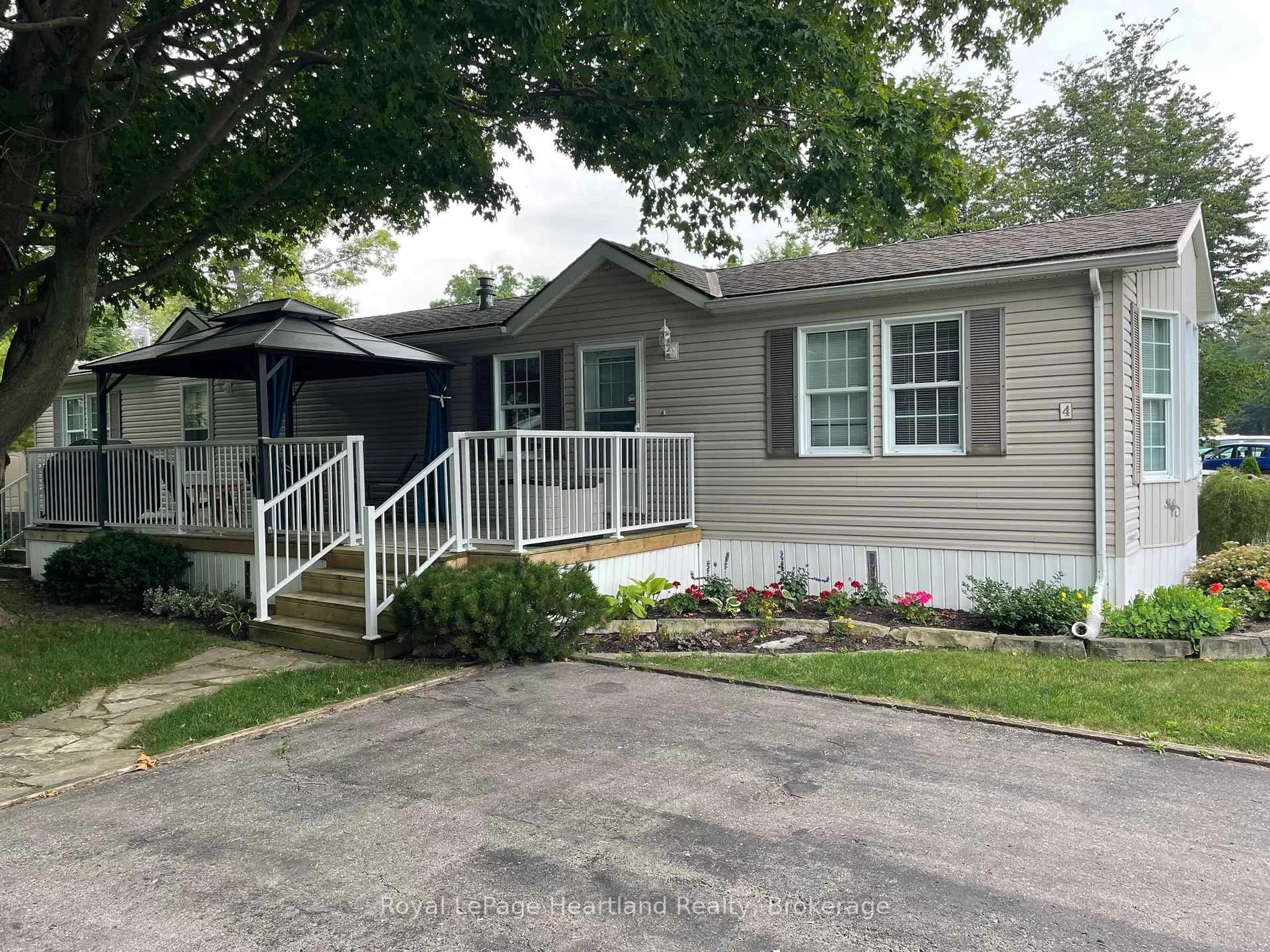 Home with vinyl exterior material, street for 4 IROQUOIS Lane, Ashfield-Colborne-Wawanosh Ontario N7A 3Y2