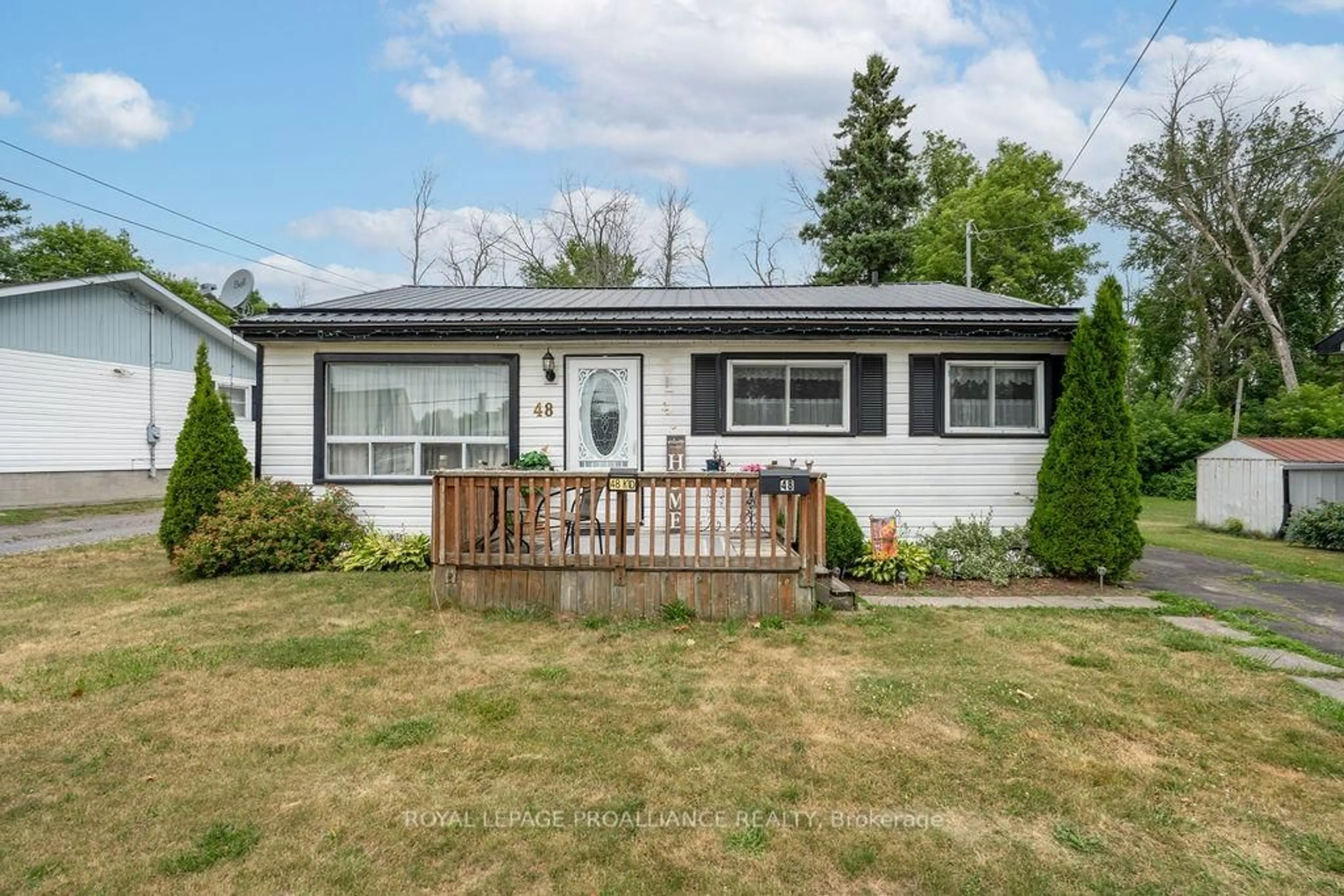 Home with vinyl exterior material, street for 48 Kidd Ave, Quinte West Ontario K8V 2C7