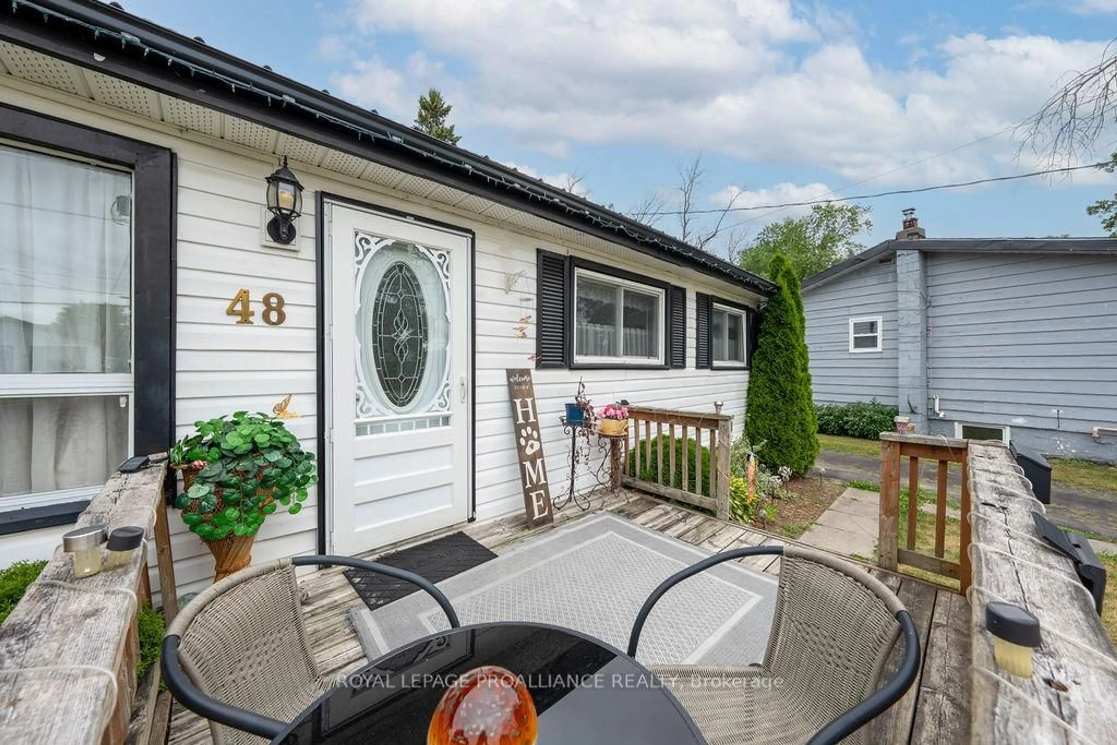 Home with vinyl exterior material, street for 48 Kidd Ave, Quinte West Ontario K8V 2C7