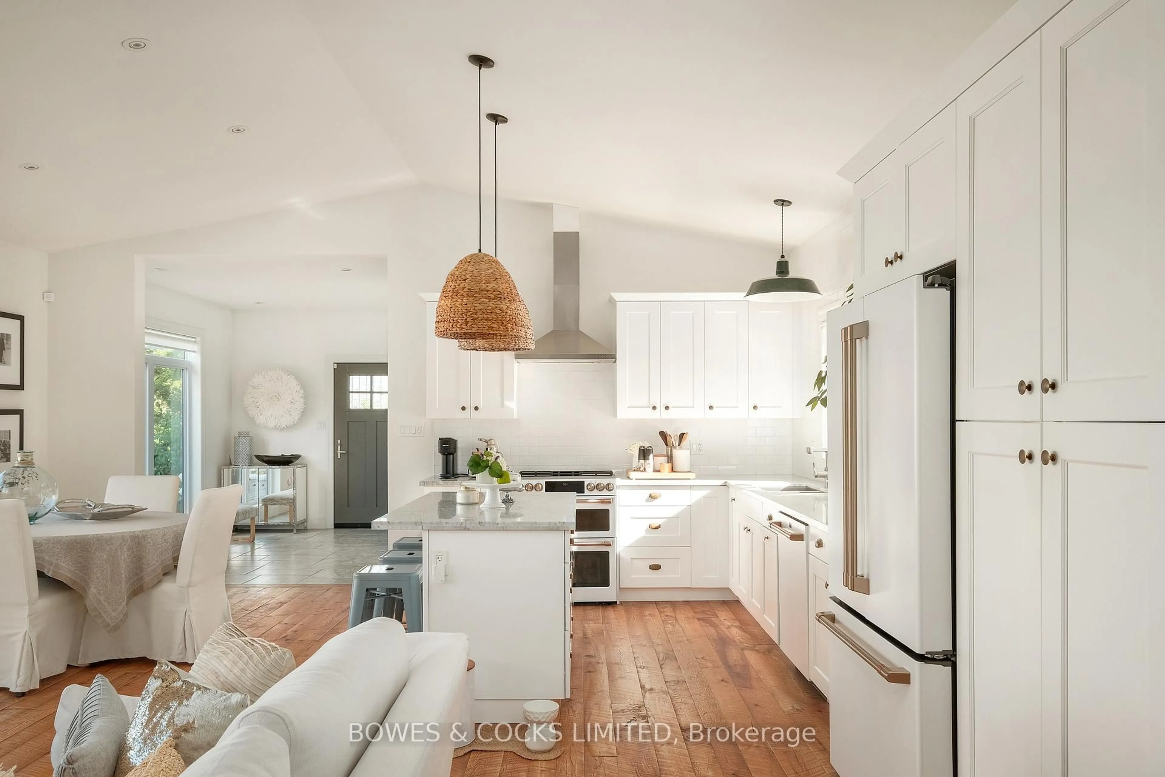 Open concept kitchen, wood/laminate floor for 1009 Serpent Mounds Rd, Otonabee-South Monaghan Ontario K0L 2G0