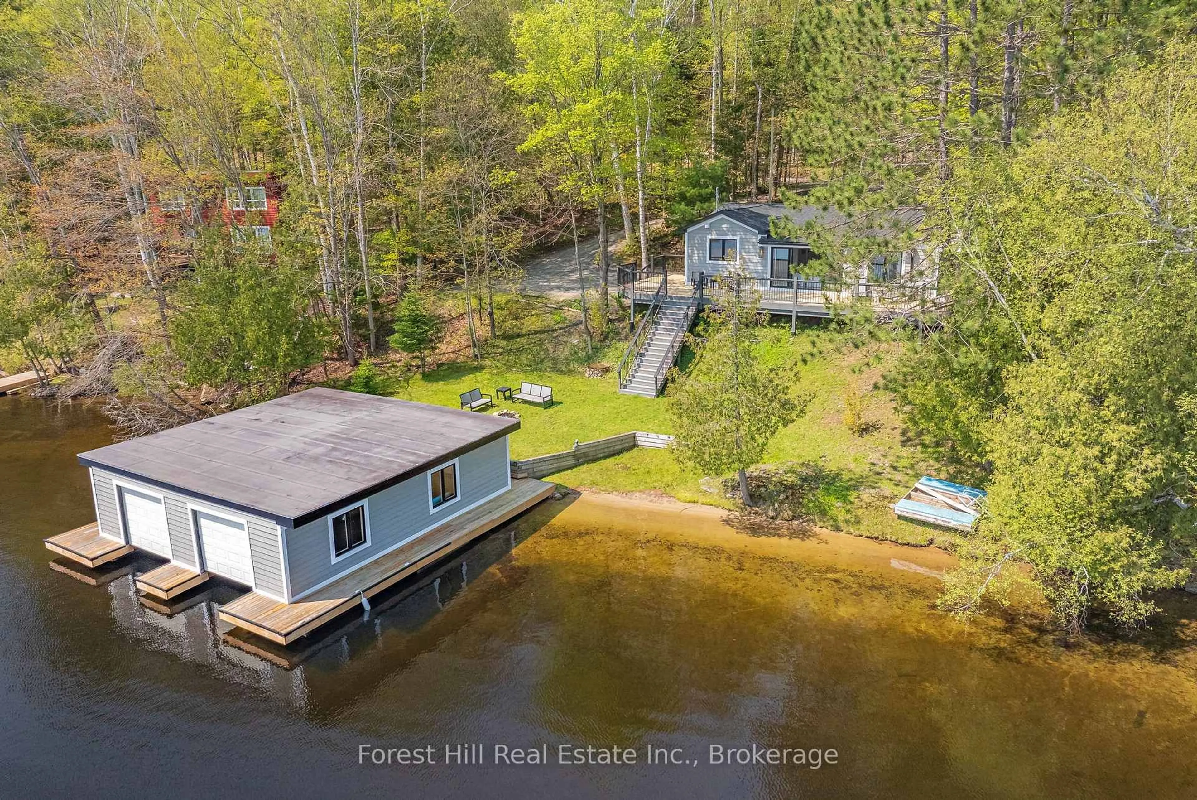 A pic from outside/outdoor area/front of a property/back of a property/a pic from drone, water/lake/river/ocean view for 1017 WHITE PINE Rd, Lake of Bays Ontario P1H 2J3