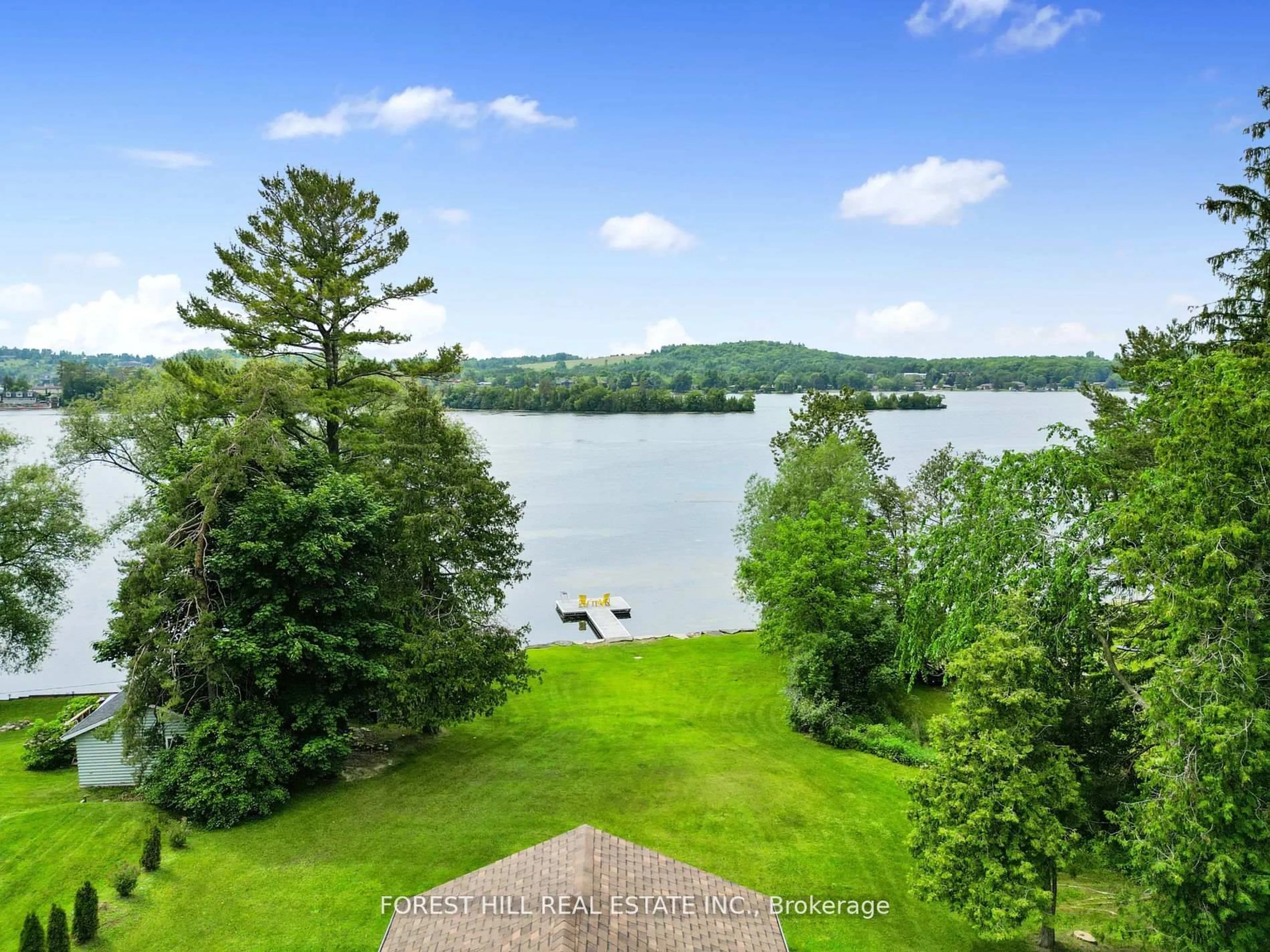 A pic from outside/outdoor area/front of a property/back of a property/a pic from drone, water/lake/river/ocean view for 360 Fife Ave, Selwyn Ontario K9J 0C6