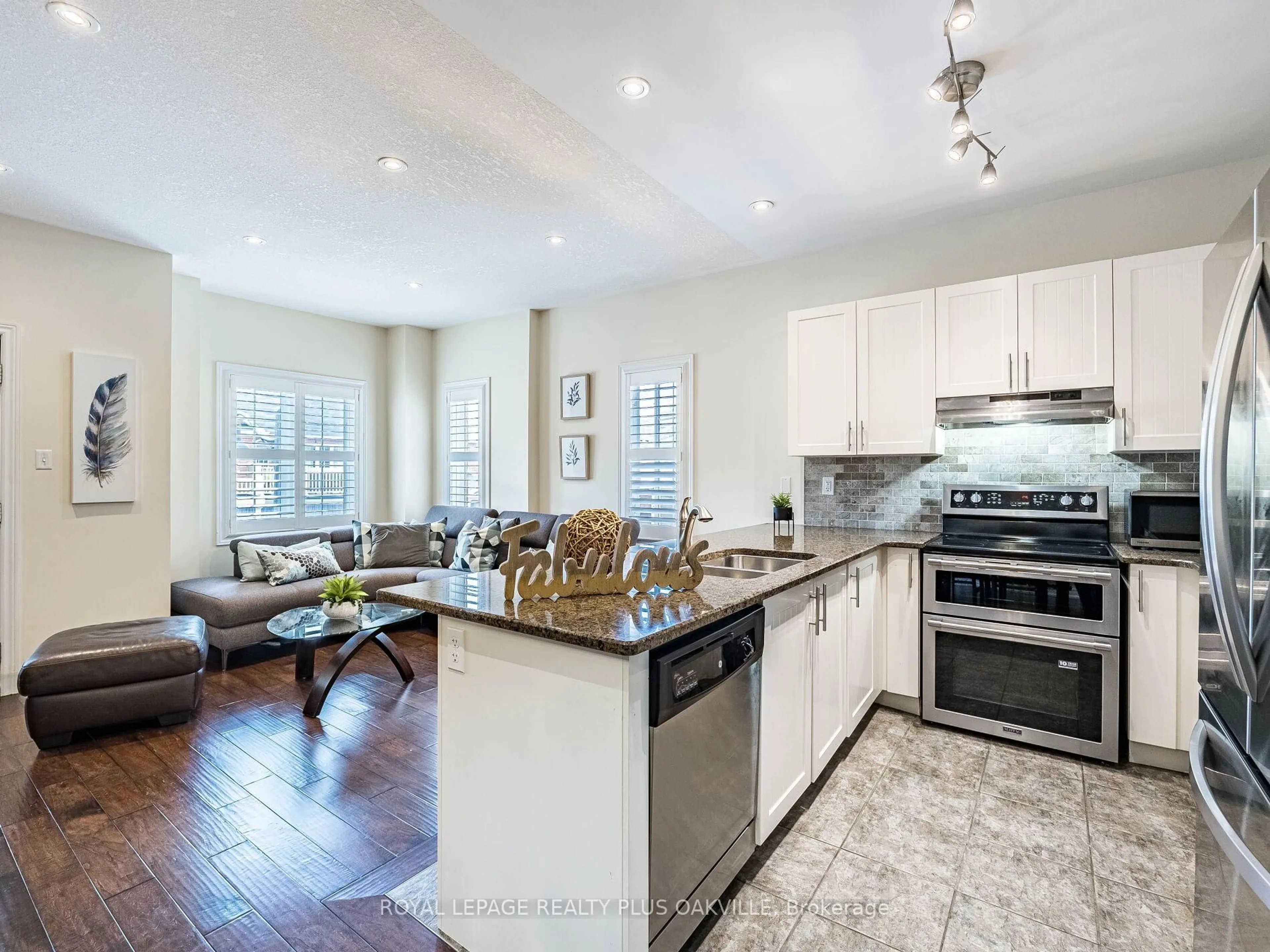 Open concept kitchen, ceramic/tile floor for 54 Nisbet Blvd #12, Hamilton Ontario L8B 0Y3