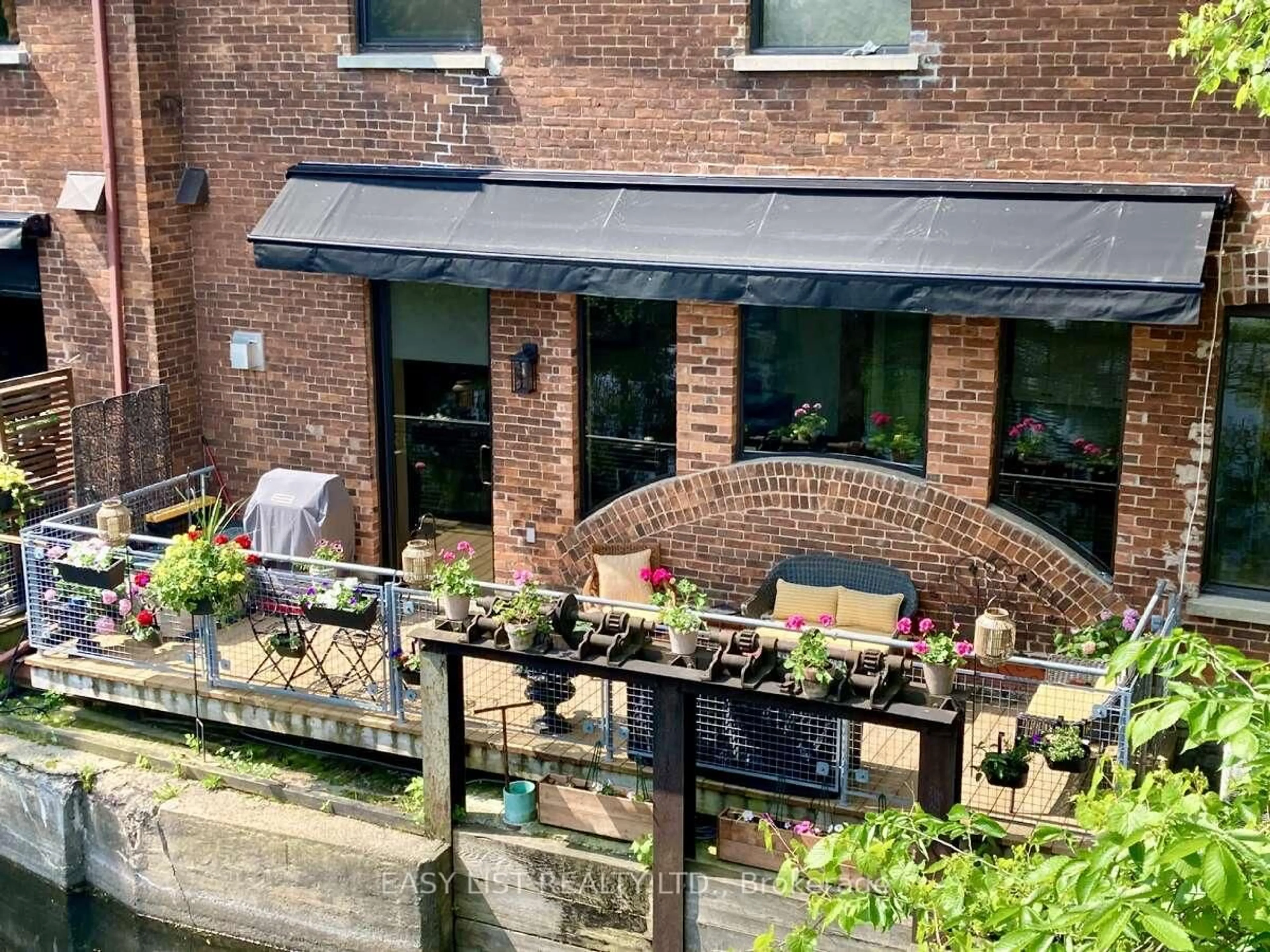 A pic from outside/outdoor area/front of a property/back of a property/a pic from drone, city buildings view from balcony for 83 Little Bridge St #112, Almonte Ontario K0A 1A0