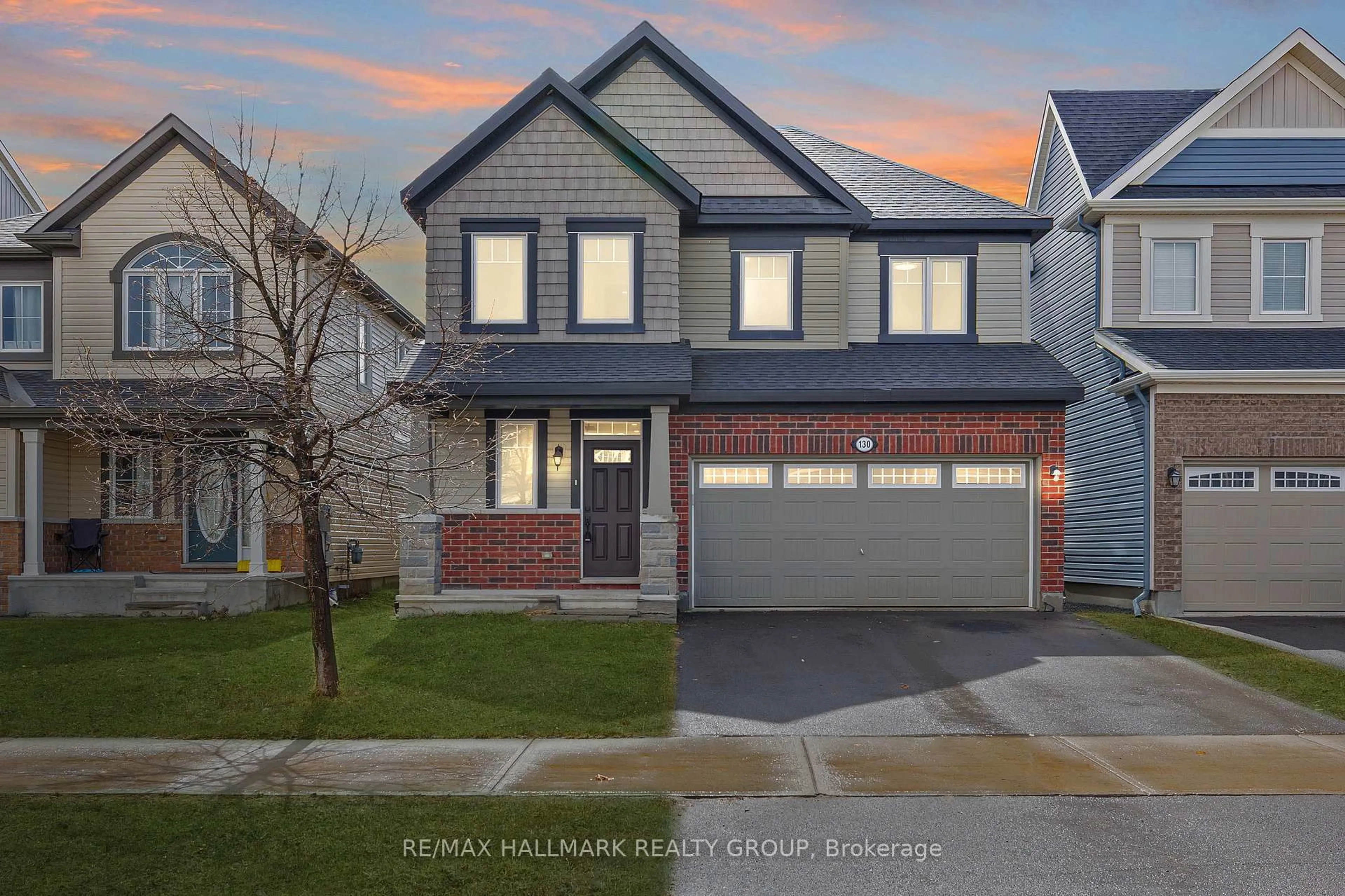 Home with vinyl exterior material, street for 130 Cranesbill Rd, Ottawa Ontario K2V 0J5