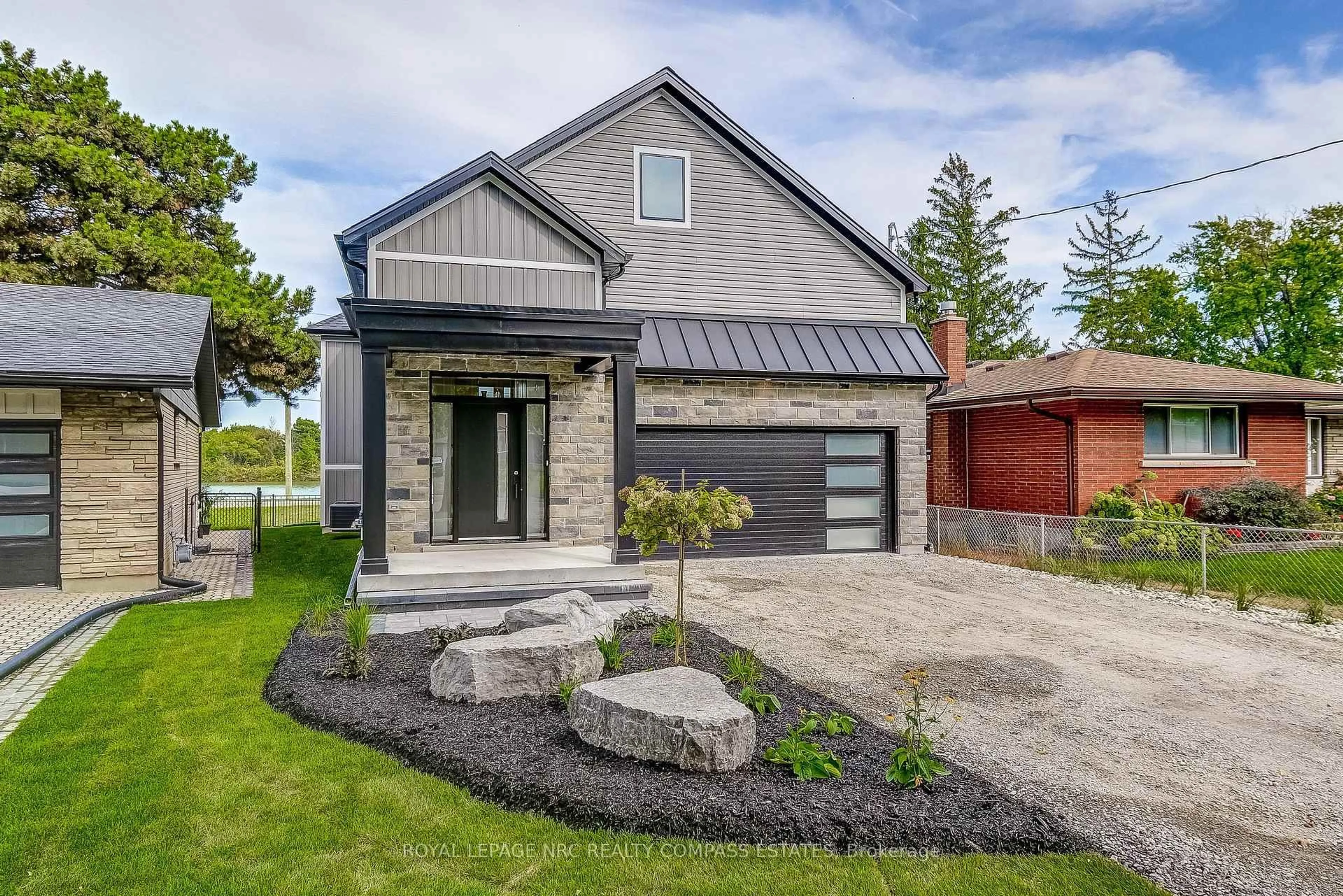 Home with brick exterior material, street for 38A Neptune Dr, St. Catharines Ontario L2M 2S2