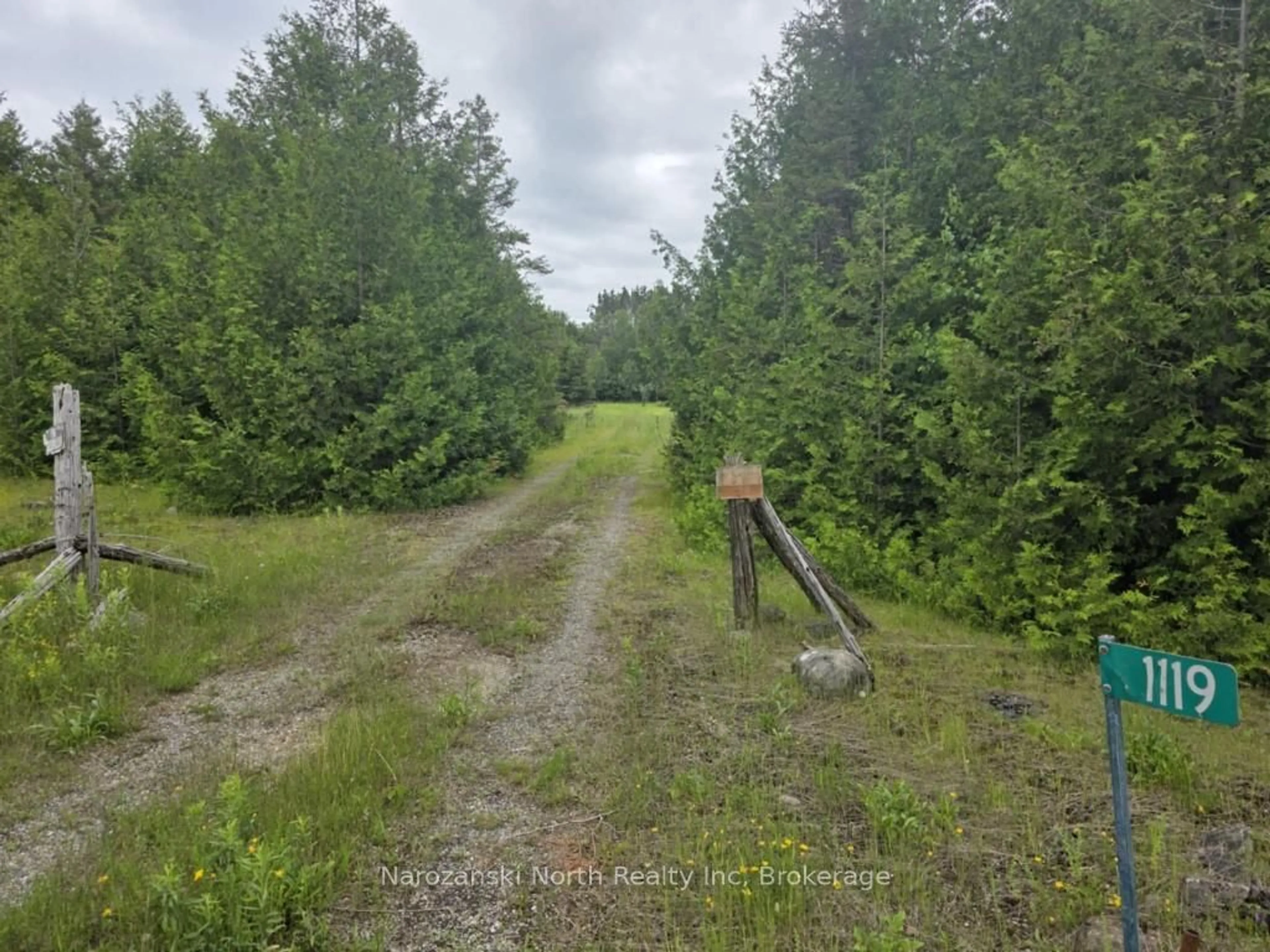 A pic from outside/outdoor area/front of a property/back of a property/a pic from drone, forest/trees view for 1119 Blue Rd, Central Manitoulin Ontario P0P 1S0