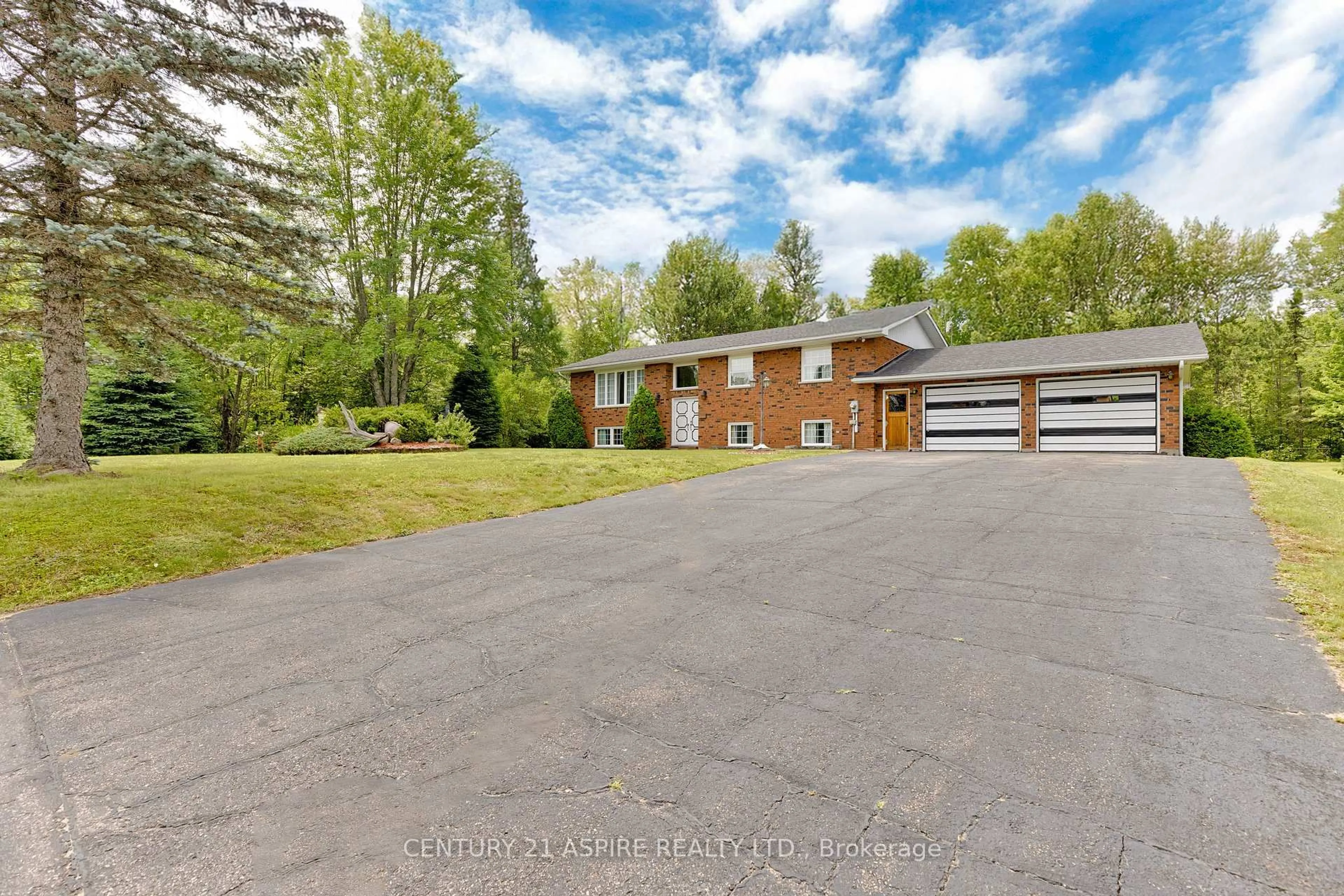 A pic from outside/outdoor area/front of a property/back of a property/a pic from drone, street for 18 Biesenthal Rd, Petawawa Ontario K8H 2Y9