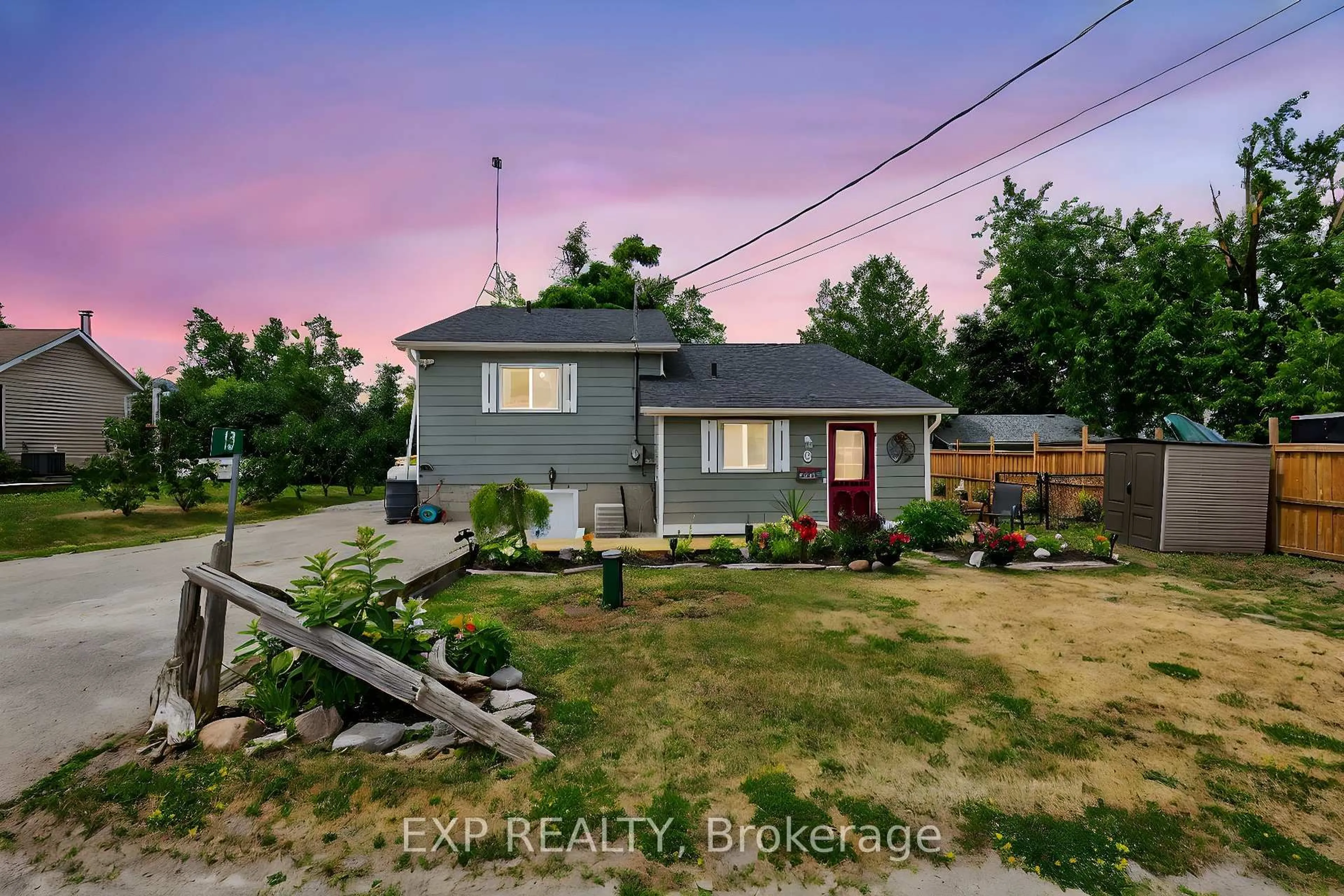 A pic from outside/outdoor area/front of a property/back of a property/a pic from drone, unknown for 13 Third St, Kawartha Lakes Ontario K0M 1L0