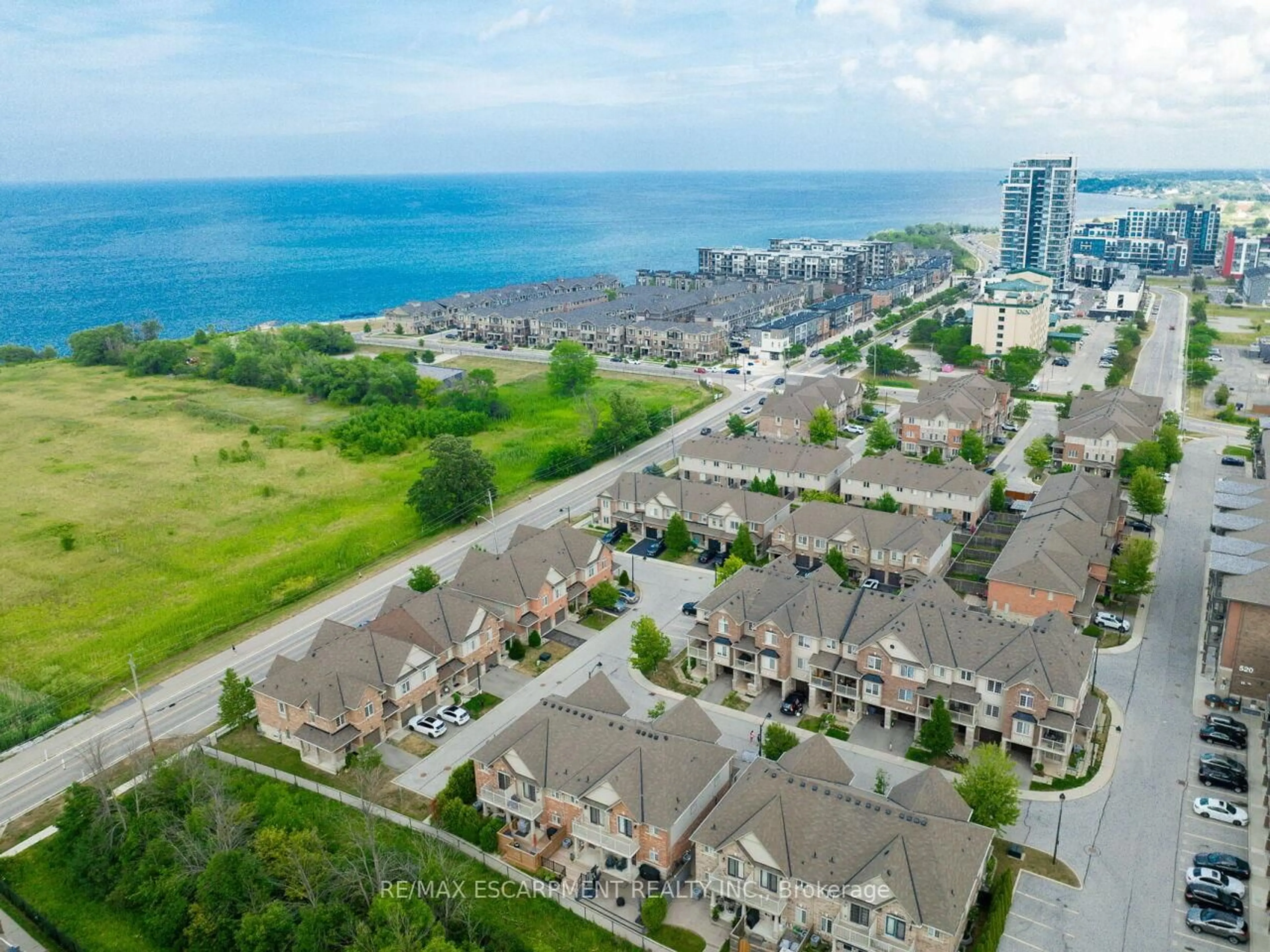 A pic from outside/outdoor area/front of a property/back of a property/a pic from drone, water/lake/river/ocean view for 515 Winston Rd #84, Grimsby Ontario L3M 0C8