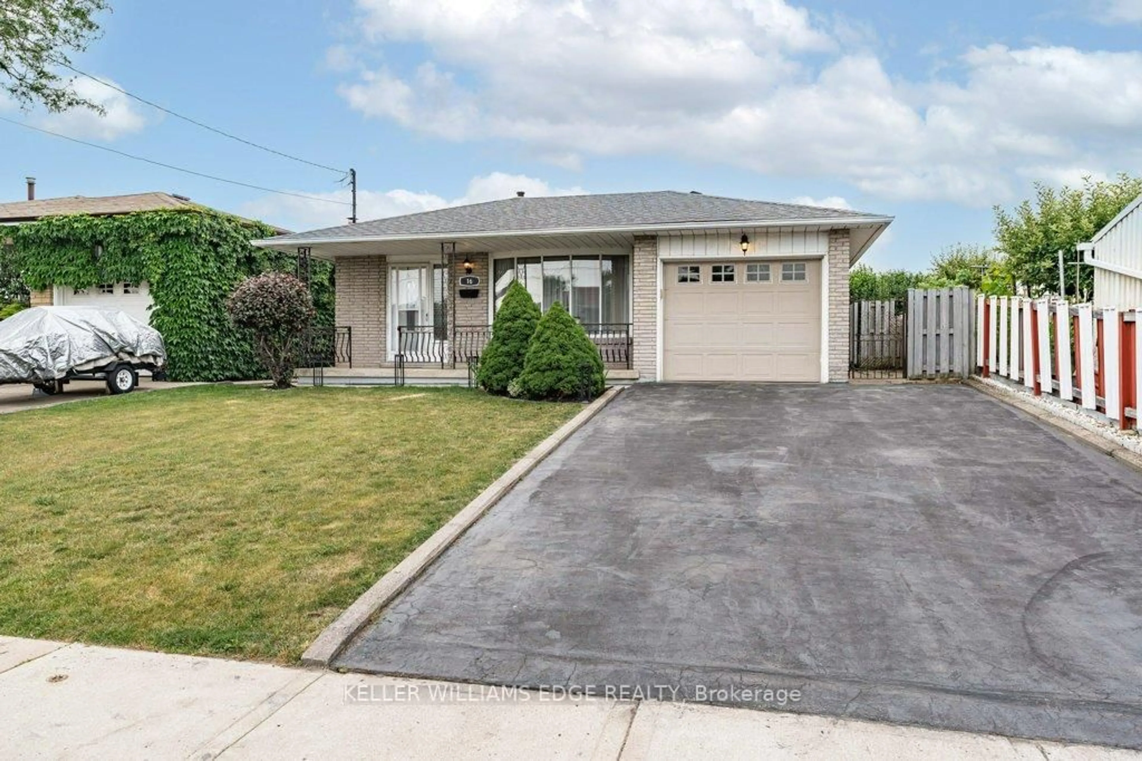 Home with vinyl exterior material, street for 16 Evelyn St, Hamilton Ontario L8E 3K2