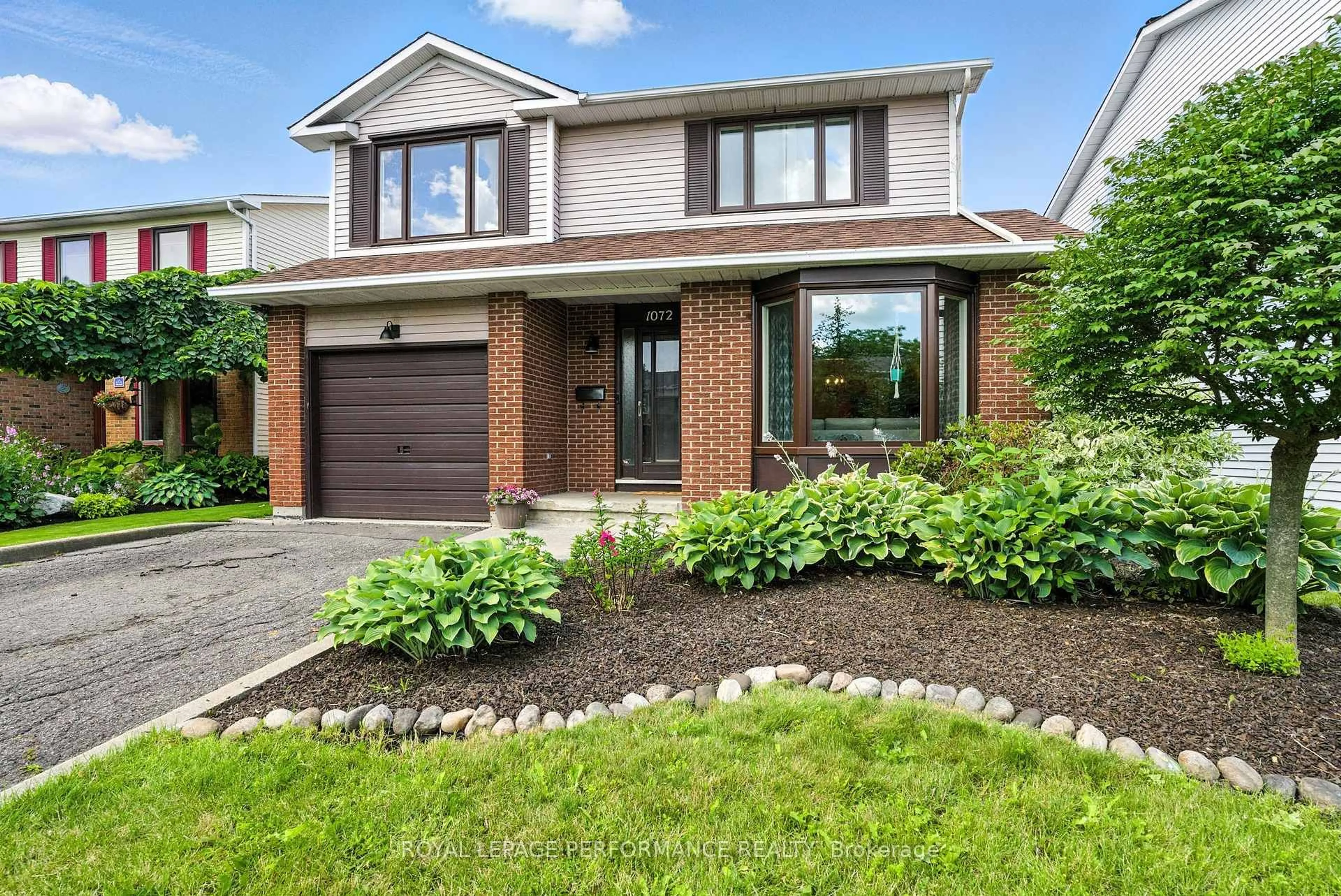 Home with brick exterior material, street for 1072 St Germain Cres, Ottawa Ontario K1C 2L8