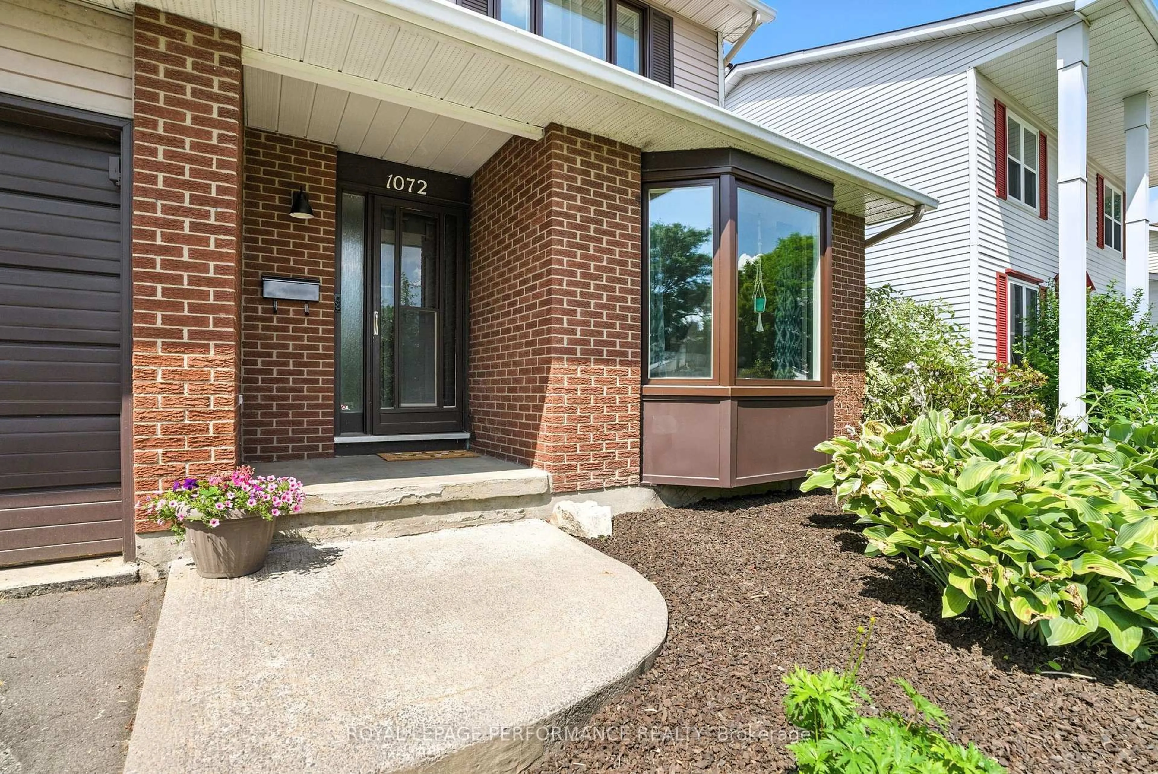 Home with brick exterior material, street for 1072 St Germain Cres, Ottawa Ontario K1C 2L8