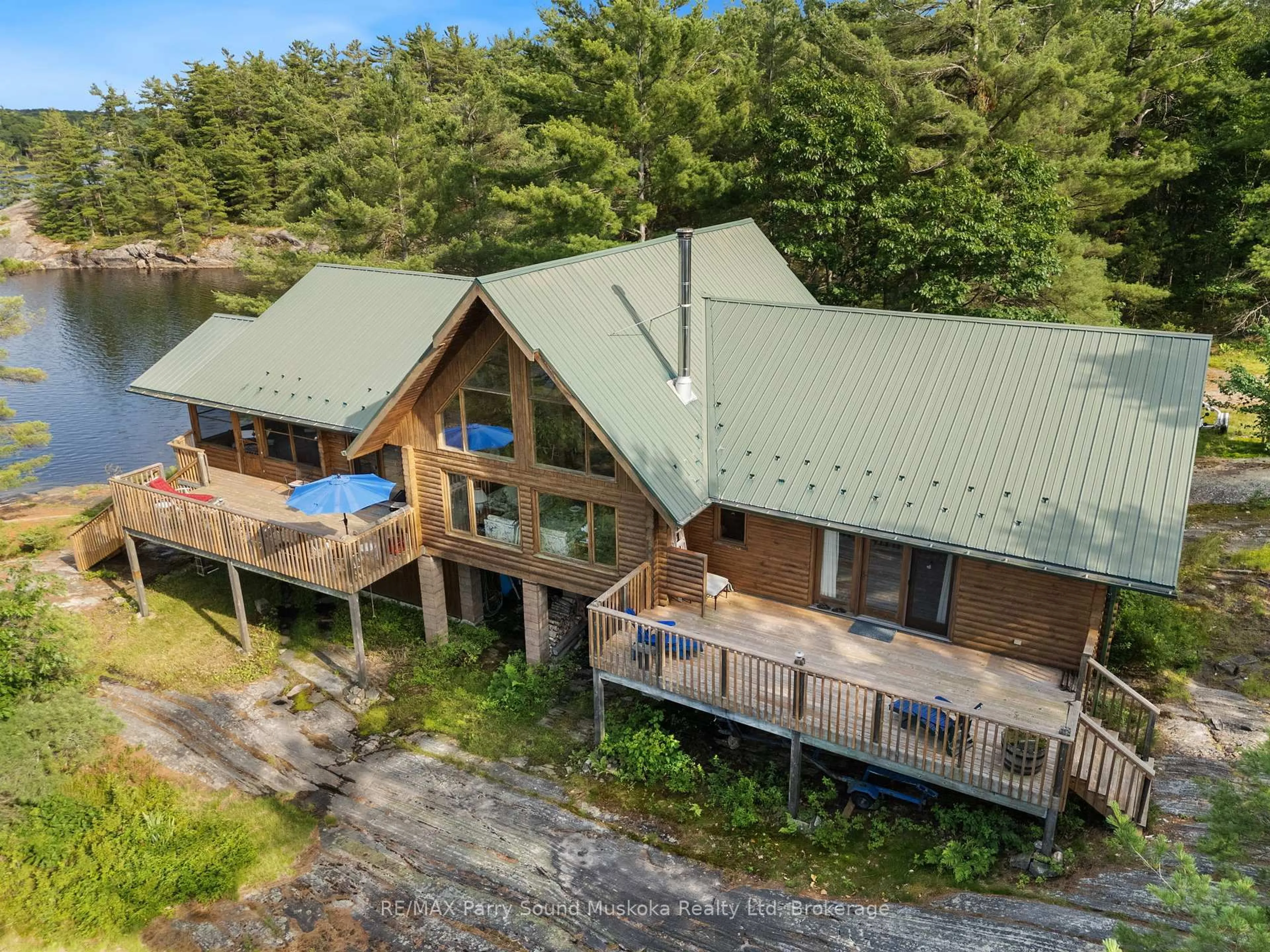A pic from outside/outdoor area/front of a property/back of a property/a pic from drone, water/lake/river/ocean view for 594 Georgian Bay Water, The Archipelago Ontario P0C 1H0