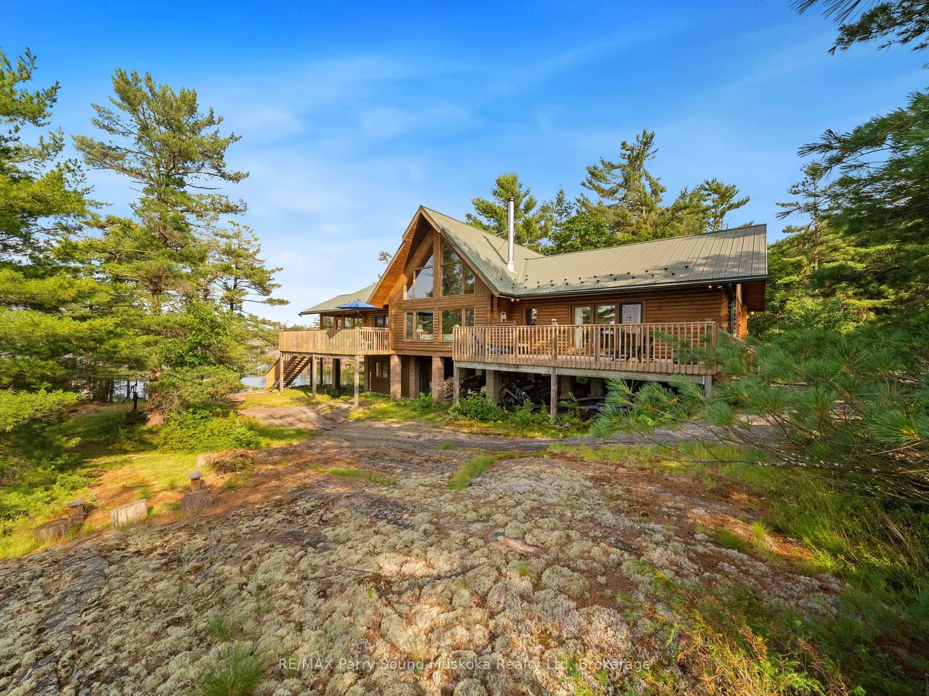 A pic from outside/outdoor area/front of a property/back of a property/a pic from drone, water/lake/river/ocean view for 594 Georgian Bay Water, The Archipelago Ontario P0C 1H0