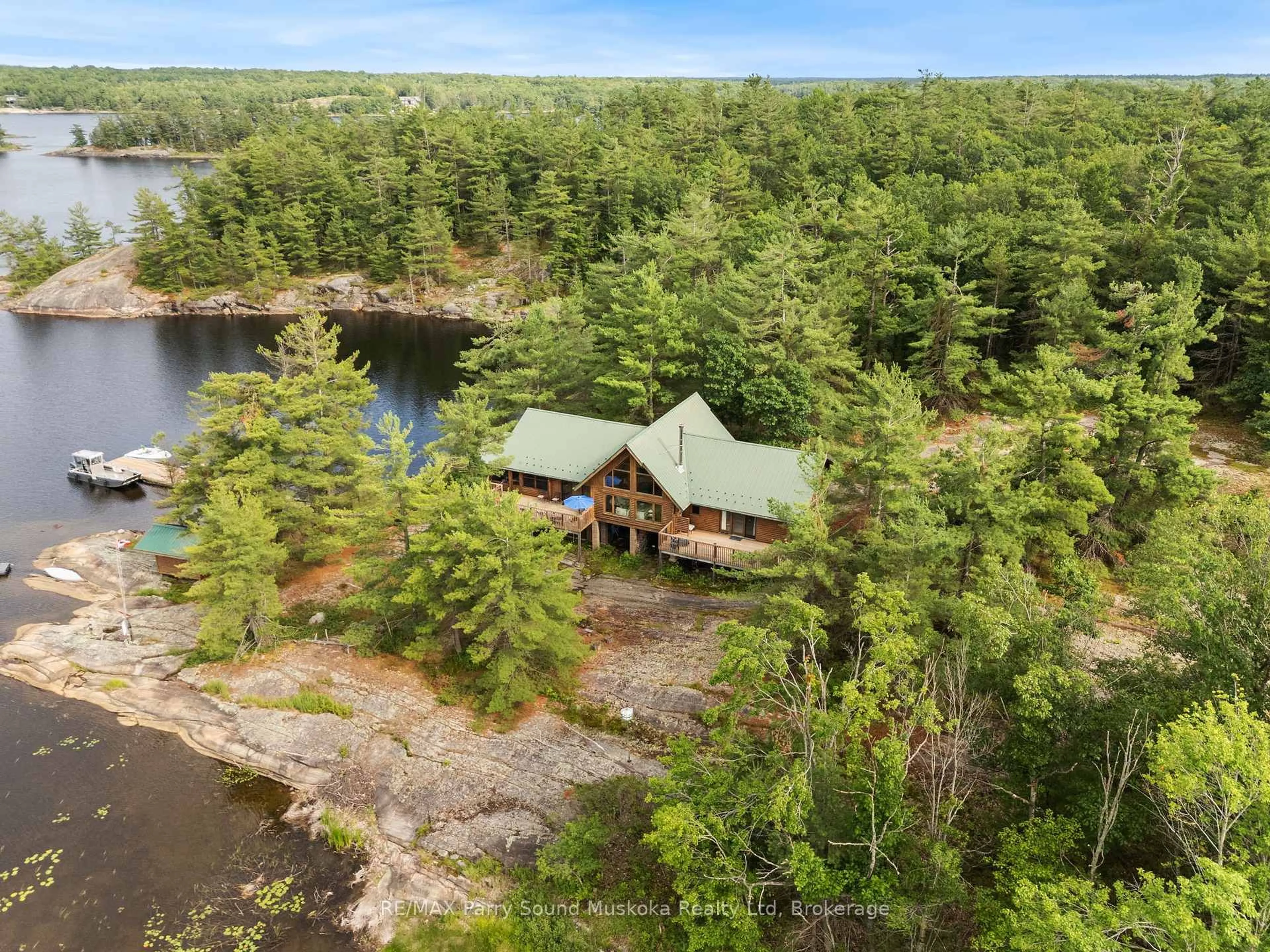 A pic from outside/outdoor area/front of a property/back of a property/a pic from drone, water/lake/river/ocean view for 594 Georgian Bay Water, The Archipelago Ontario P0C 1H0