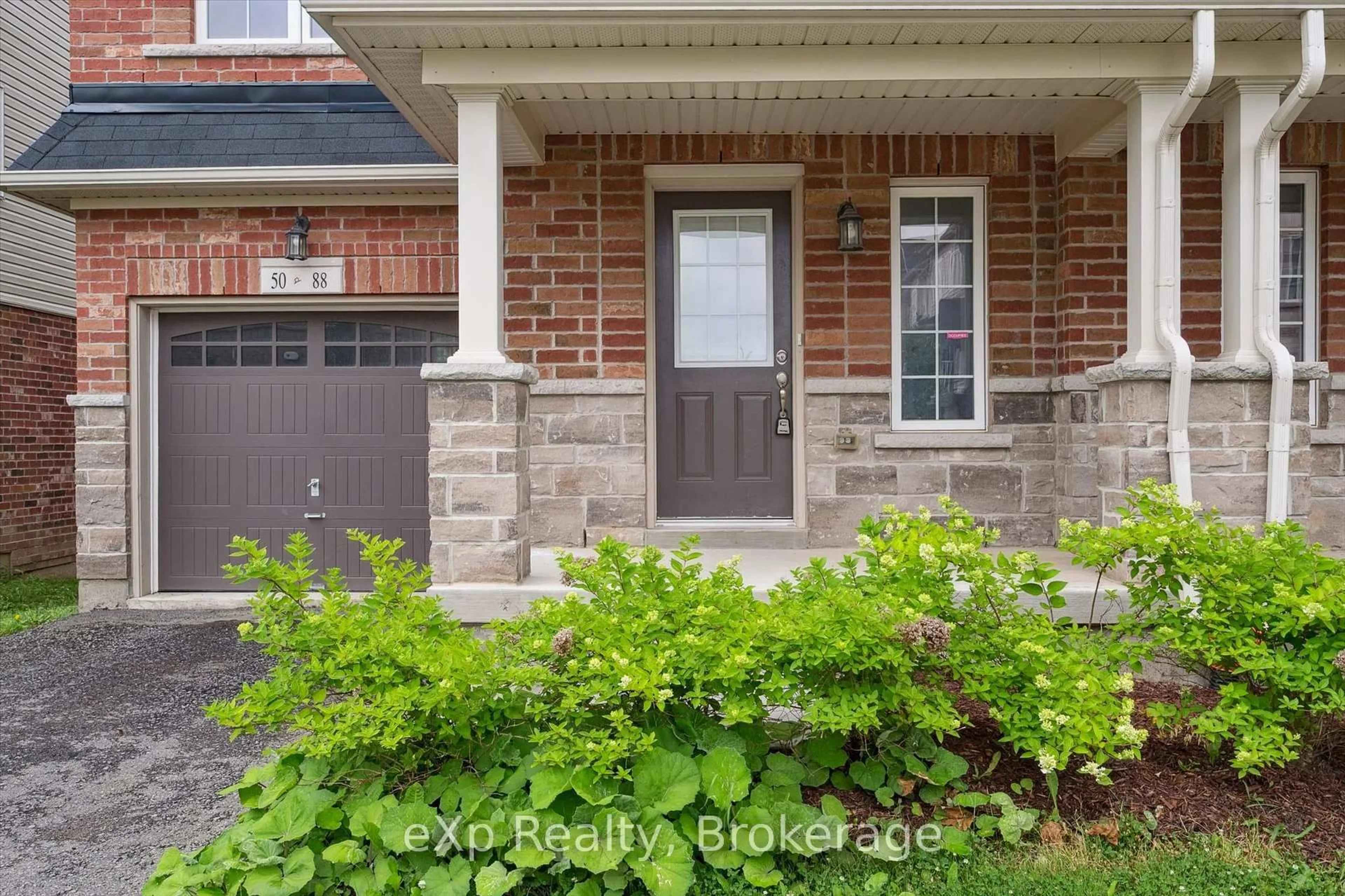 Home with brick exterior material, street for 88 Decorso Dr #50, Guelph Ontario N1L 0A1