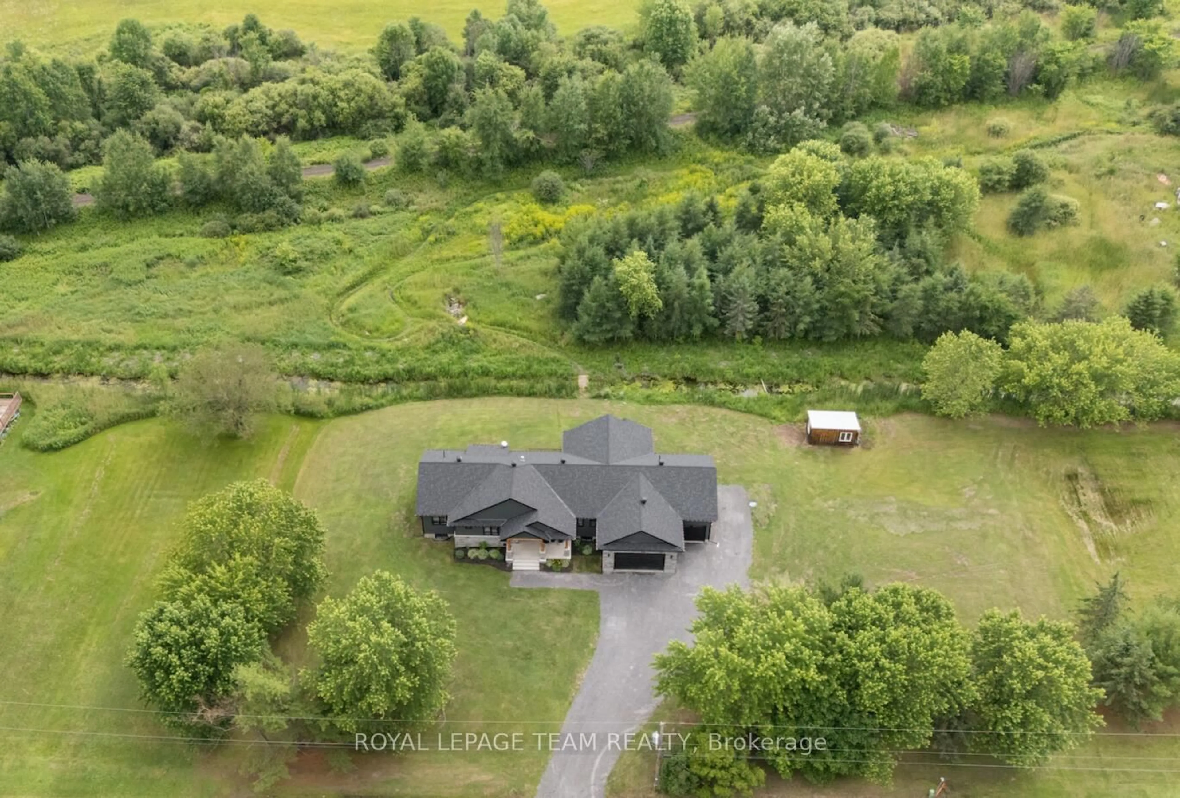 A pic from outside/outdoor area/front of a property/back of a property/a pic from drone, unknown for 3783 Woodkilton Rd, Ottawa Ontario K0A 3M0