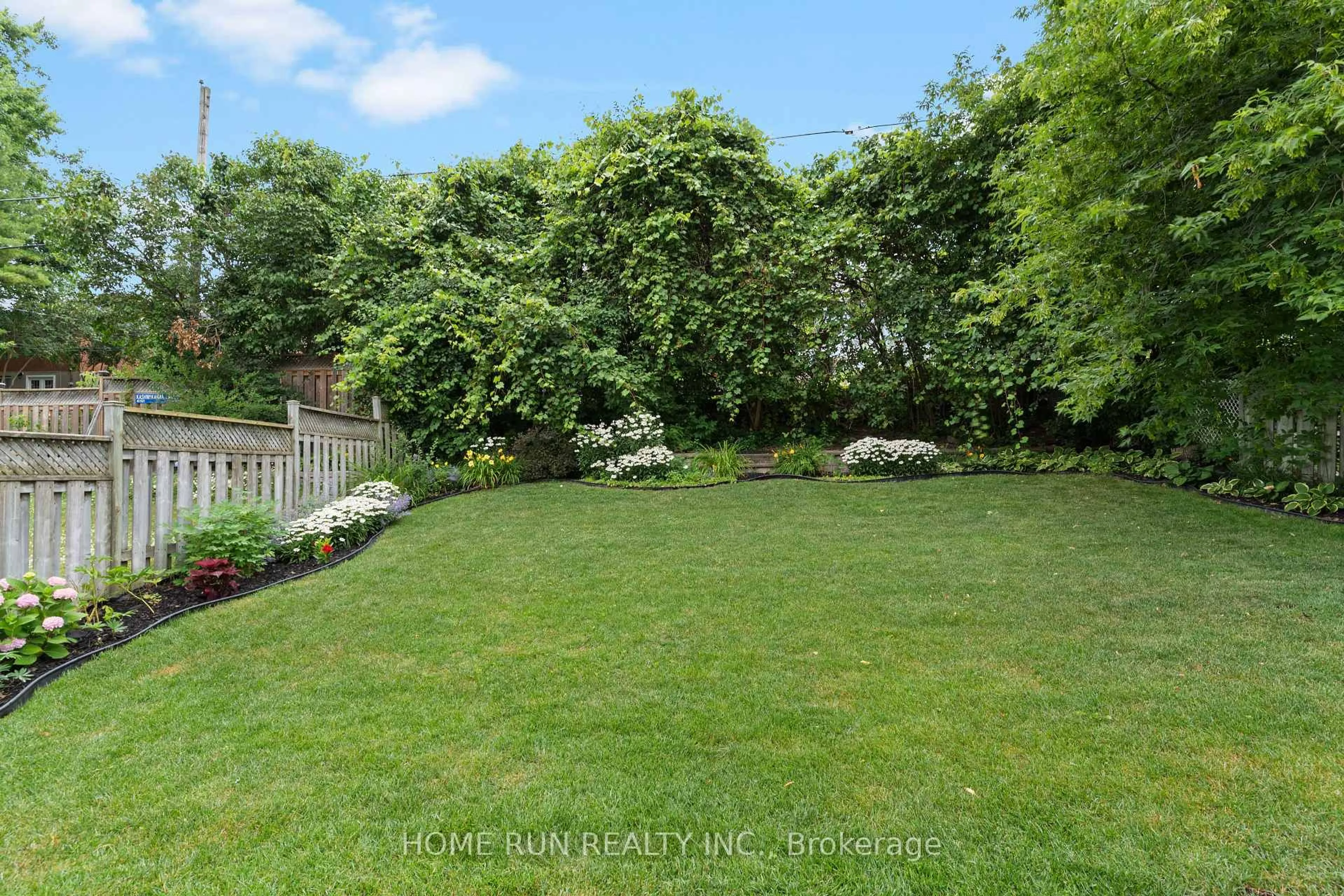 A pic from outside/outdoor area/front of a property/back of a property/a pic from drone, forest/trees view for 938 Lombardy St, Kingston Ontario K7M 9C2