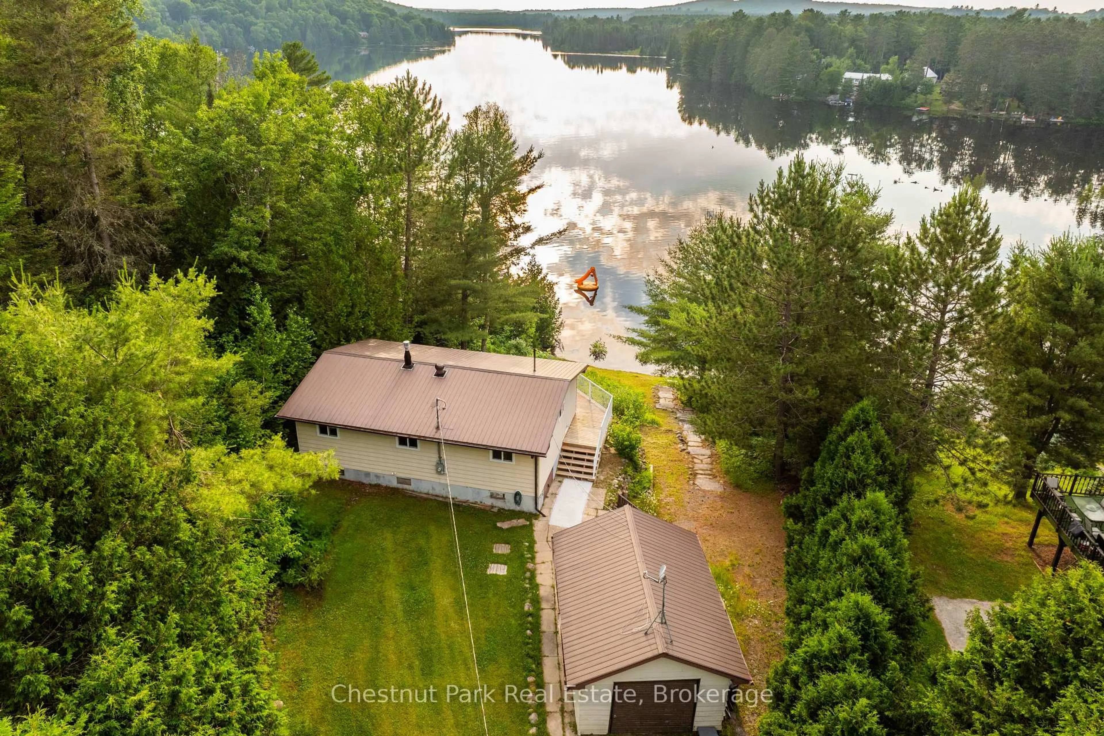 A pic from outside/outdoor area/front of a property/back of a property/a pic from drone, water/lake/river/ocean view for 80 Cedar Lane, Joly Ontario P0A 1Z0