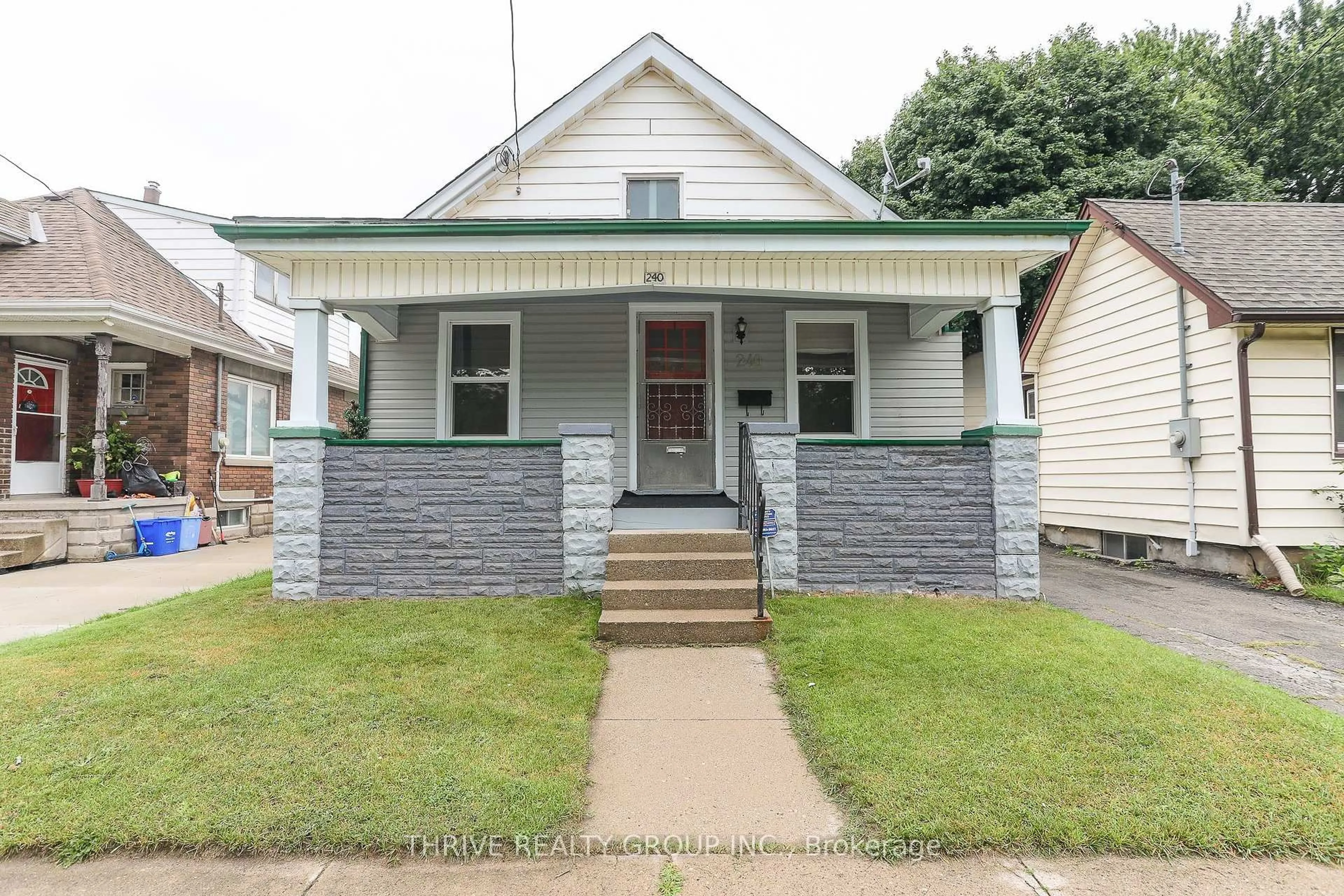Home with vinyl exterior material, street for 240 East St, London East Ontario N5Z 2S2