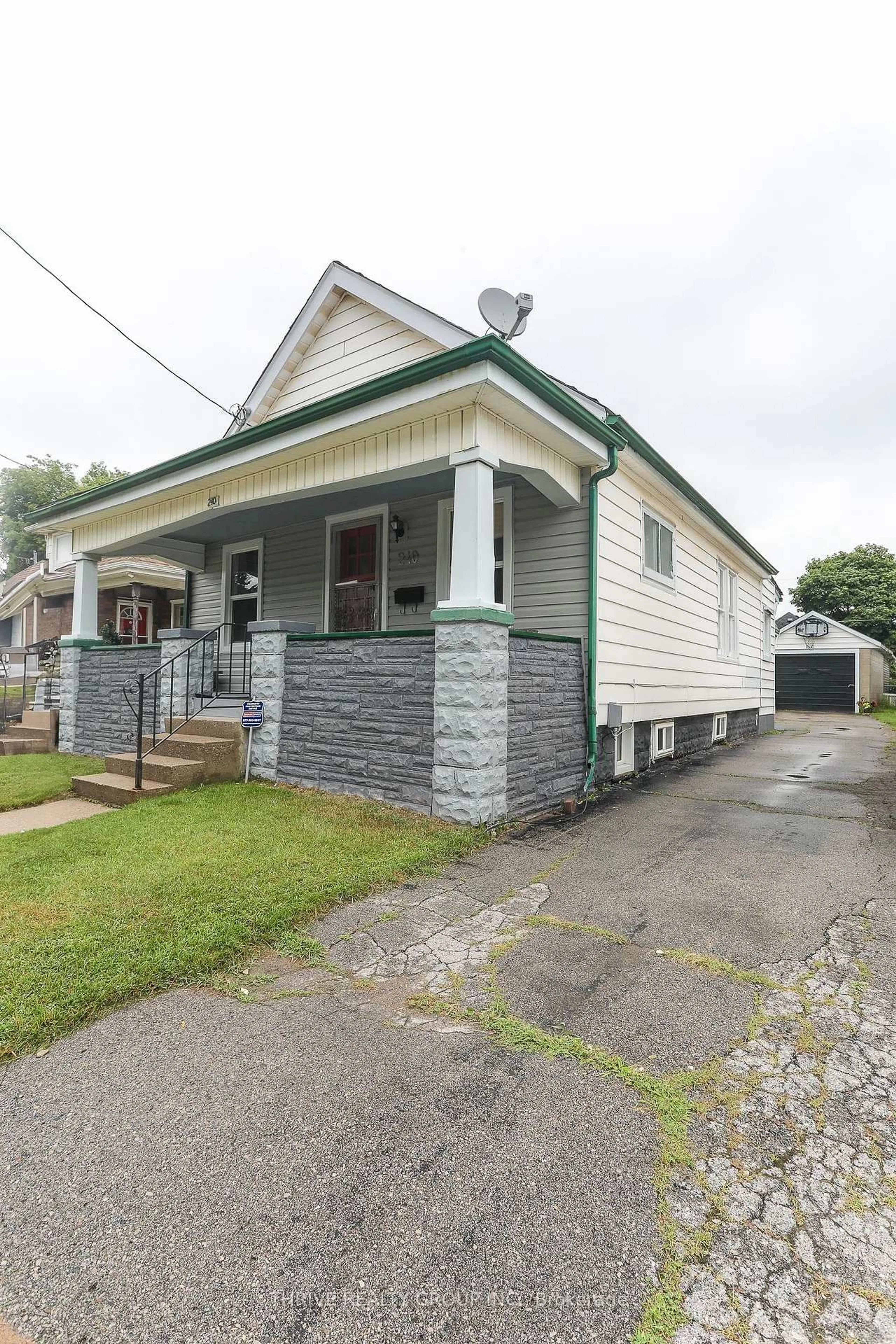 Home with vinyl exterior material, street for 240 East St, London East Ontario N5Z 2S2