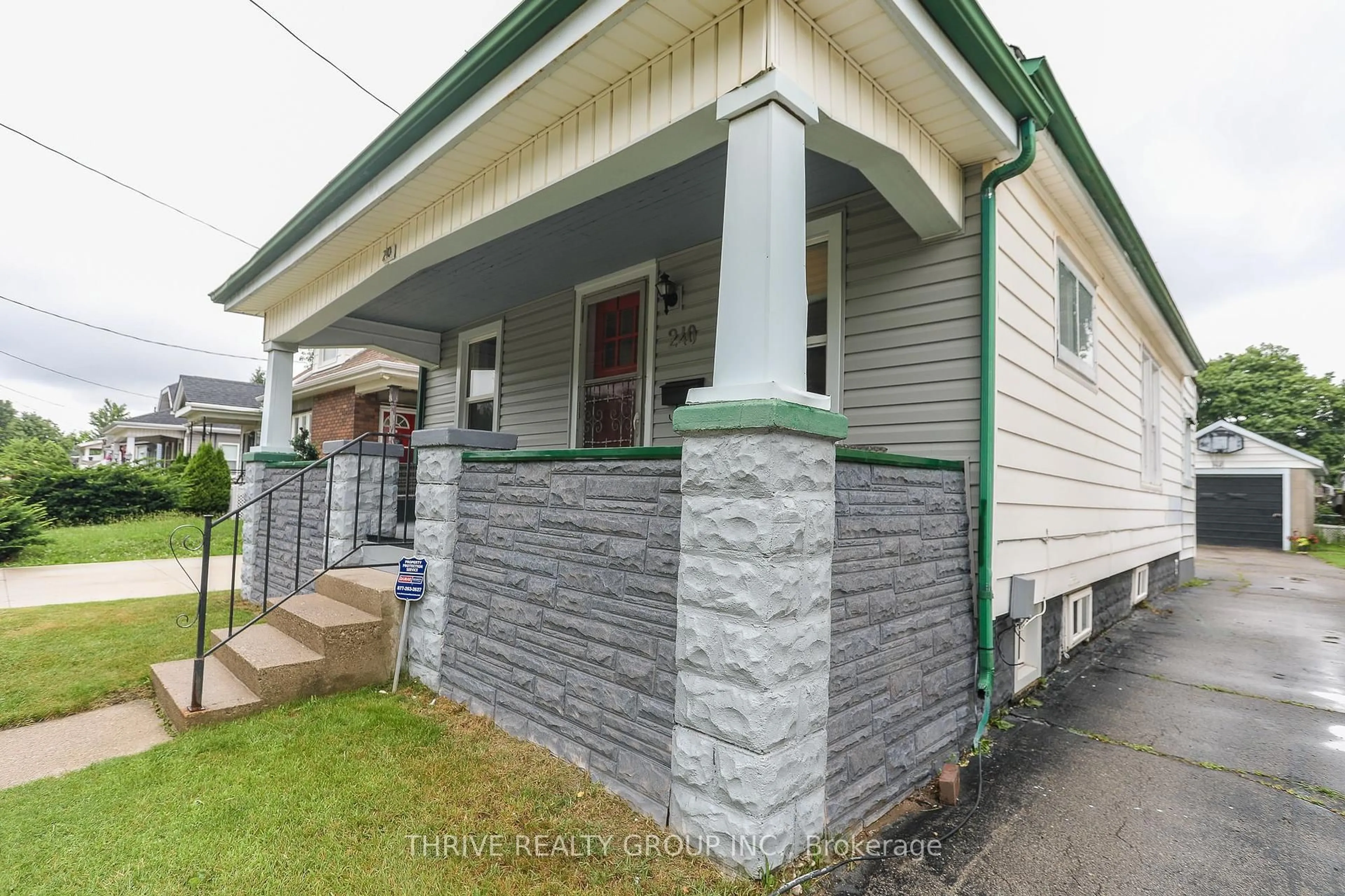 Home with vinyl exterior material, street for 240 East St, London East Ontario N5Z 2S2